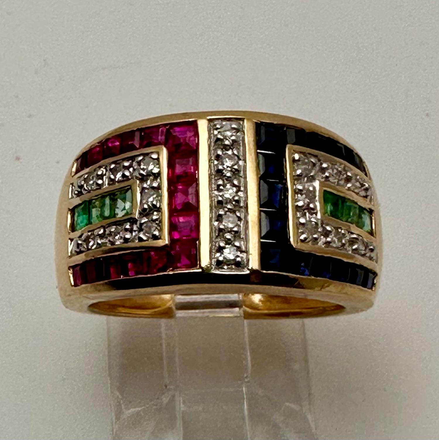 14k Yellow Gold 10.5 mm Wide Ruby Sapphire Diamond and Emerald Ring Size 10. Colored stones are princess cut with 19 round diamonds.
RUBY
This vibrant, gem-like baby name is often associated with wealth, health, passion, and success in love,