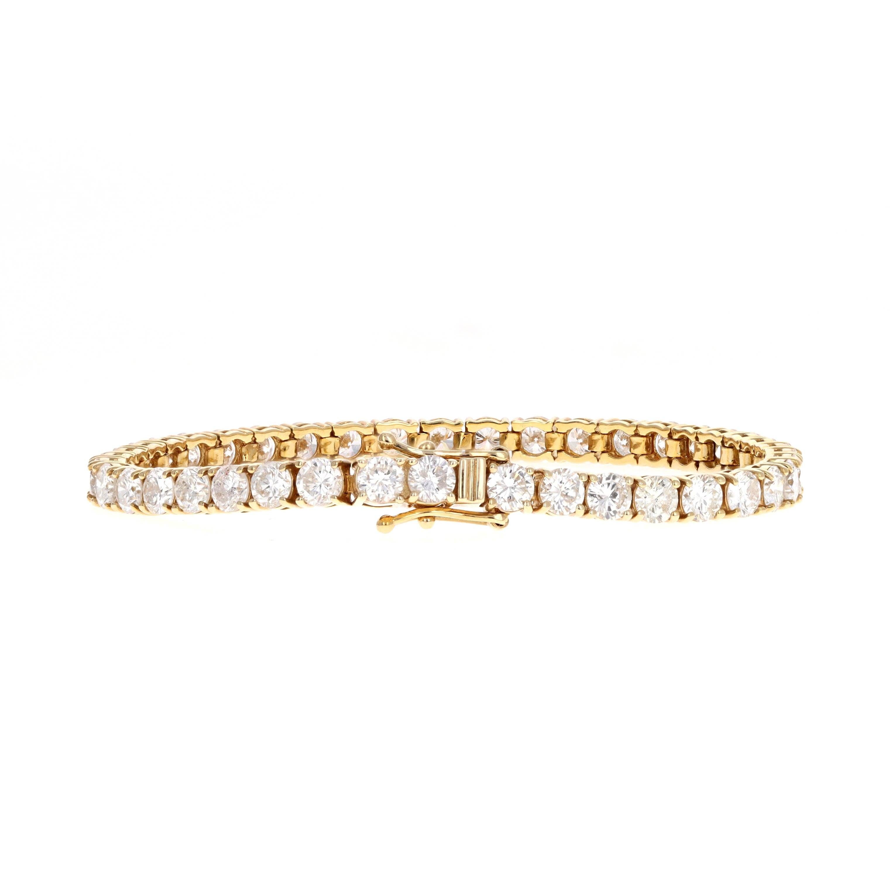 Époque : New

Composition : Or jaune 14K

Pierre principale : Quarante et un diamants ronds taillés en brillant

Poids total en carats : Environ 10,92 carats

Couleur / Clarté : G-H / SI2-I1

Longueur du bracelet : 7 pouces

Poids du bracelet : 13,6