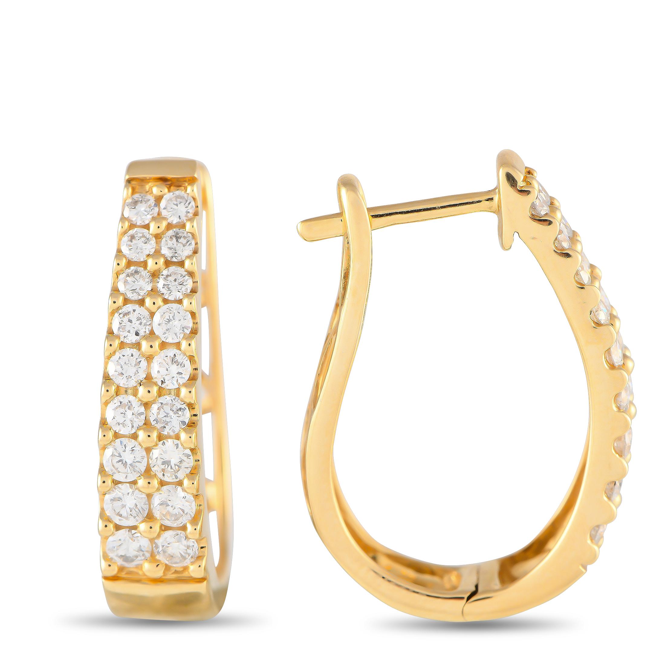Round-cut Diamonds with a total weight of 1.0 carats make these simple, elegant earrings a luxurious addition to any ensemble. Sleek and sophisticated in design, each one features a 14K Yellow Gold setting measuring 0.85 long by 0.65 wide.This