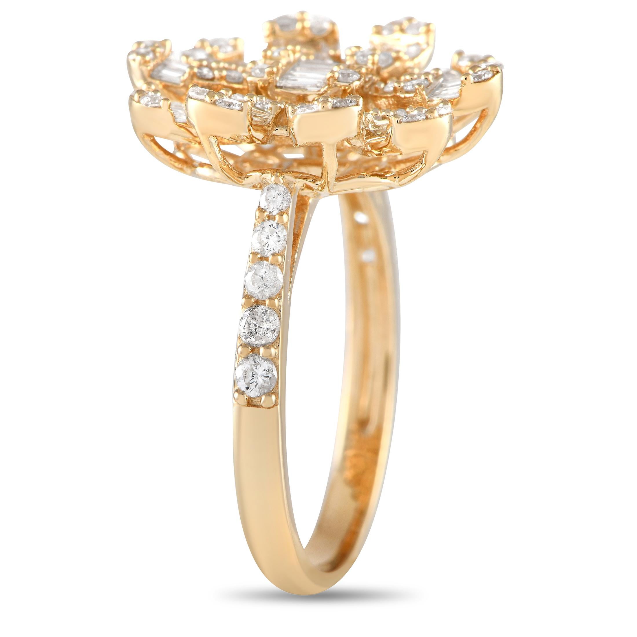 Inspired by a flower that follows the sun, this diamond ring looks like a bright ray of sunshine on the finger. It features a slim 1mm band in 14K yellow gold topped with a dazzling combination of round and baguette diamonds in a sunflower