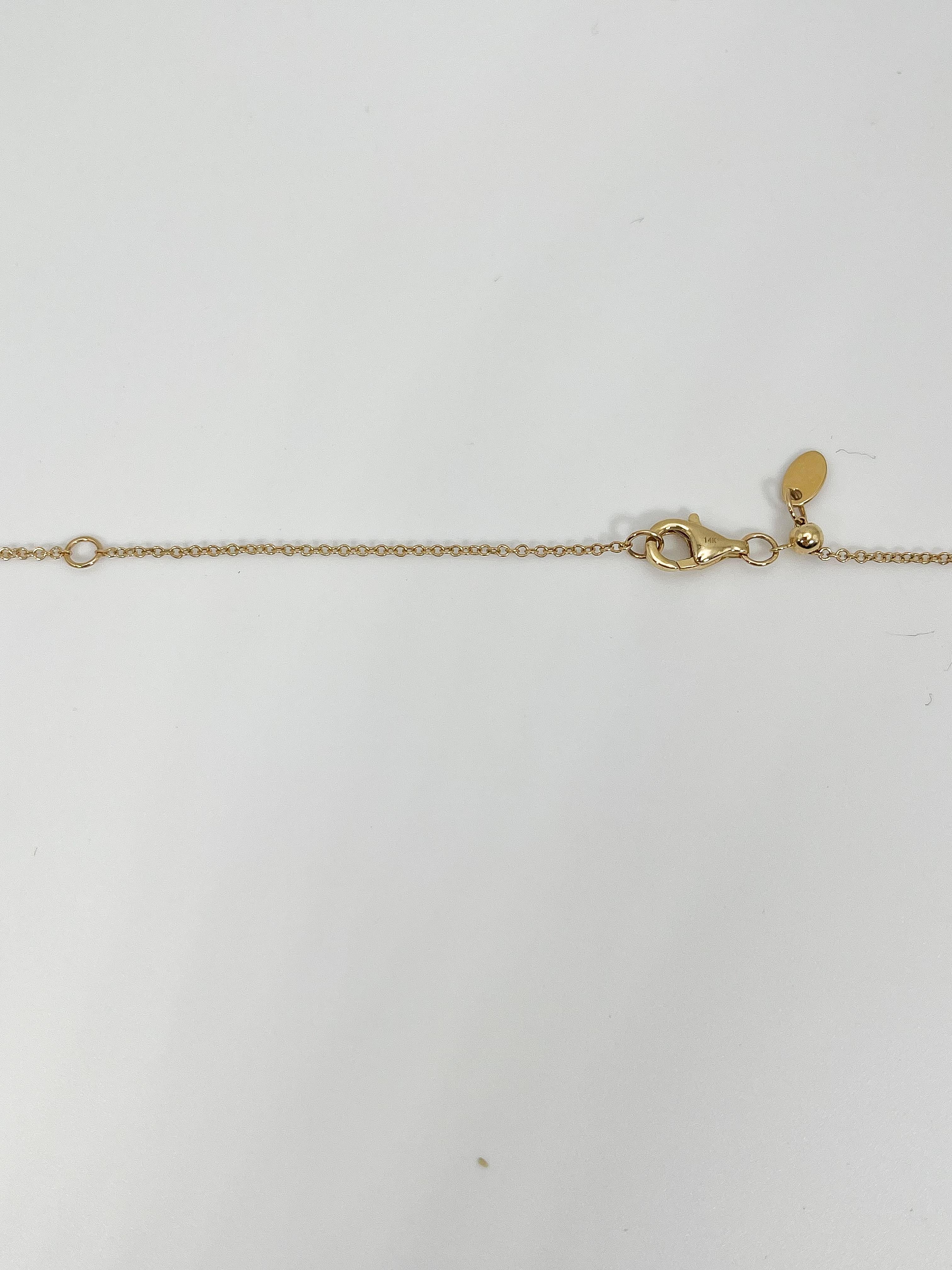 Women's 14K Yellow Gold .11 CTW Diamond Sunburst Pendant For Sale
