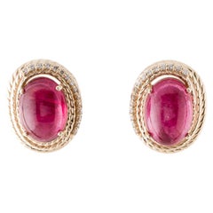 Clous d'oreilles en or jaune 14 carats, tourmaline 11,12 carats et diamants 0,25 carat