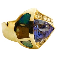 14k Yellow Gold 1.20 Trillion Cut Tanzanite, Diamond, Opal 
Citrine Ring  6.75