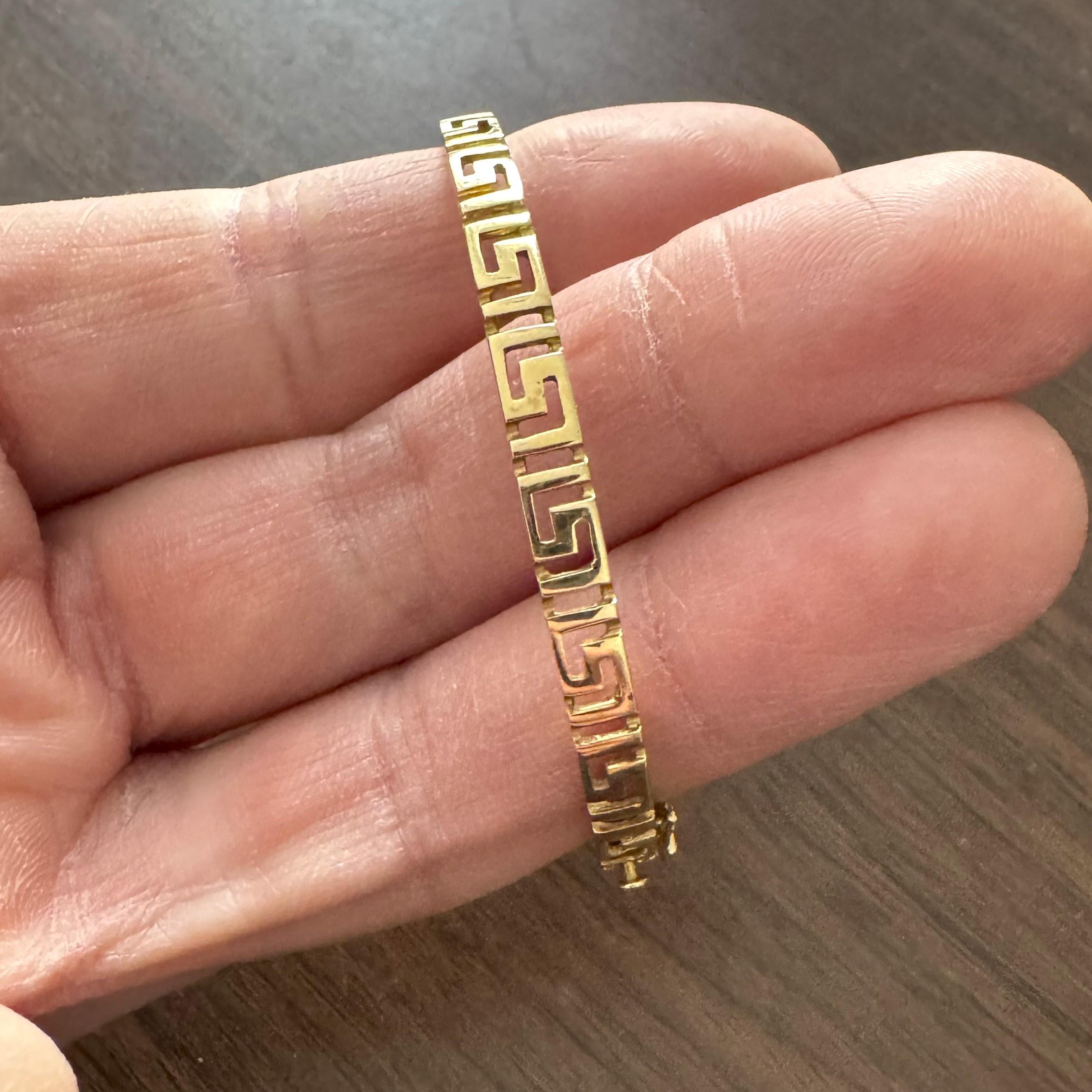 Condition:  Excellent Condition, Professionally Cleaned and Polished
Metal:  14k Gold (Marked, and Professionally Tested)
Weight:  12.2g
Length:  6.75 Inches Inner Circumference
Width:  4.5mm
Closure:  Box Tab Insert with Safety