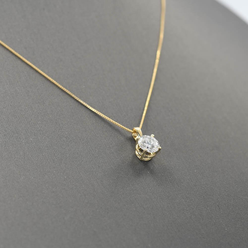 Round brilliant diamond pendant in 14k yellow gold setting.
Stamped 14k inside the bail and weighs .9 grams gross weight.
The diamond weighs 1.23 carats, H color, i1 clarity.
Excellent condition.