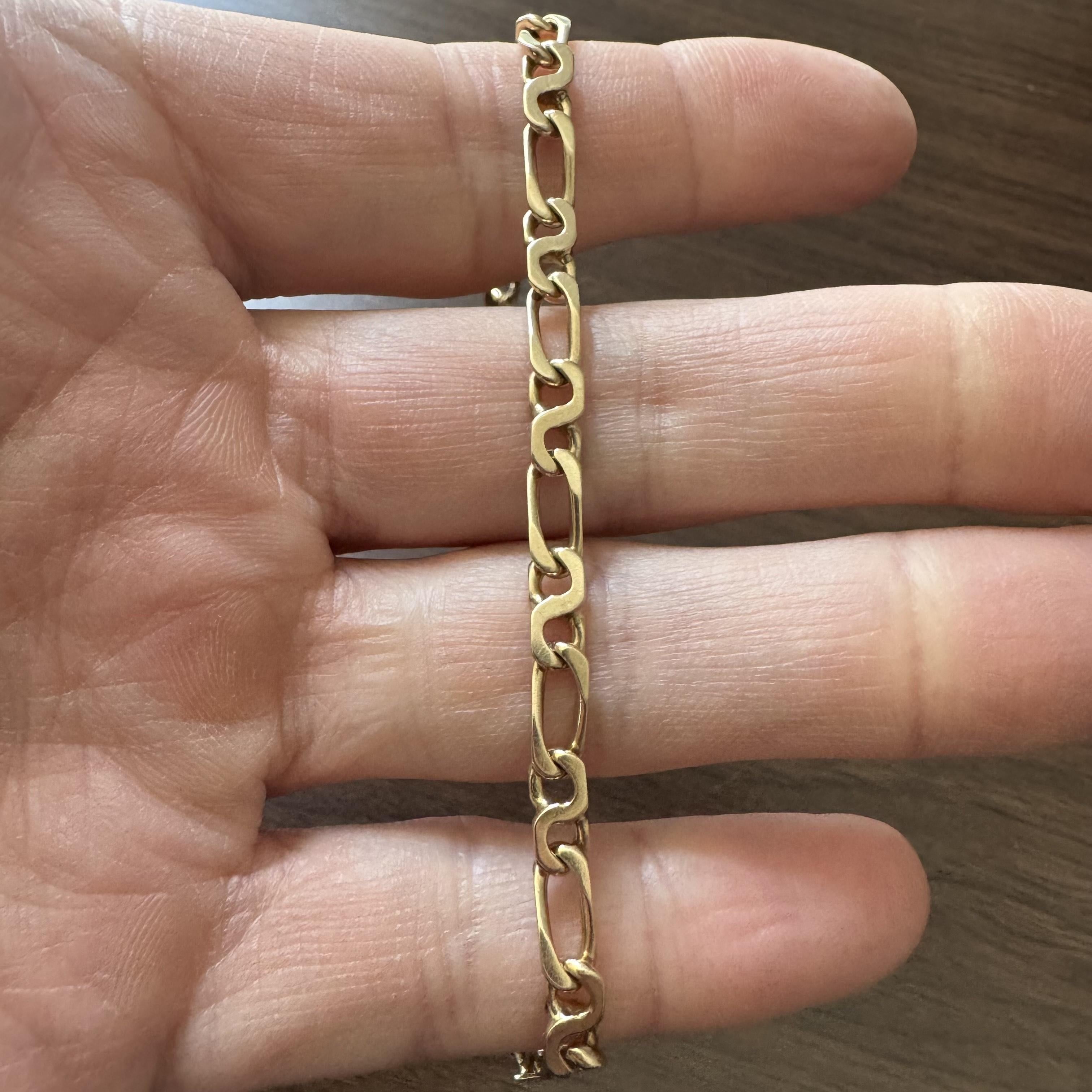 Condition:  Excellent Condition, Professionally Cleaned and Polished
Metal:  14k Gold (Marked, and Professionally Tested)
Weight:  12.5g
Length:  8 Inches
Width:  4.5mm
Closure:  Box Tab Insert with Safety Latch
Markings:  