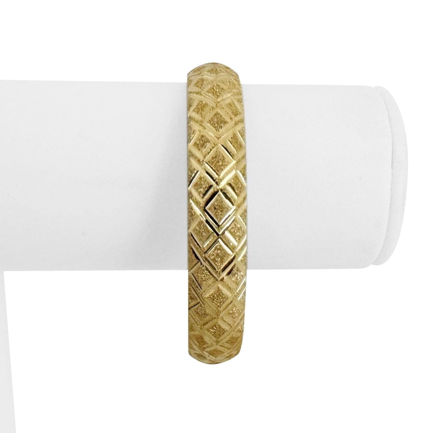 Condition:  Excellent Condition, Professionally Cleaned and Polished
Metal:  14k Gold (Marked, and Professionally Tested)
Weight:  12.8g
Length:  7 Inches
Width:  11mm
Closure:  Slide Bar Insert
Markings:  