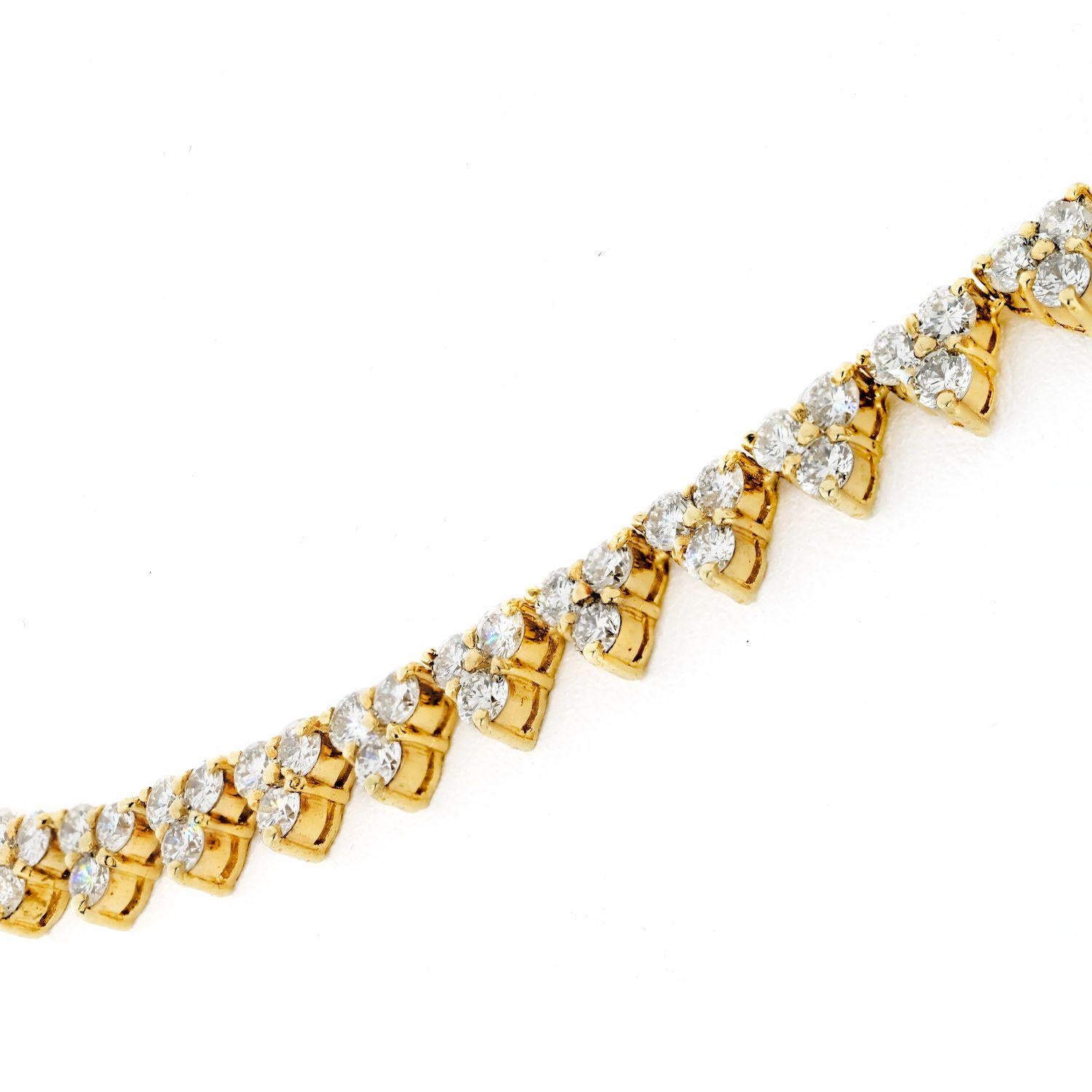 This is a stunning addition to any jewelry collection. The 13.50 ct.t.w. round brilliant-cut diamonds and the prong set trio design of polished 14kt yellow gold create a luxurious and elegant look that any lady would surely appreciate. The