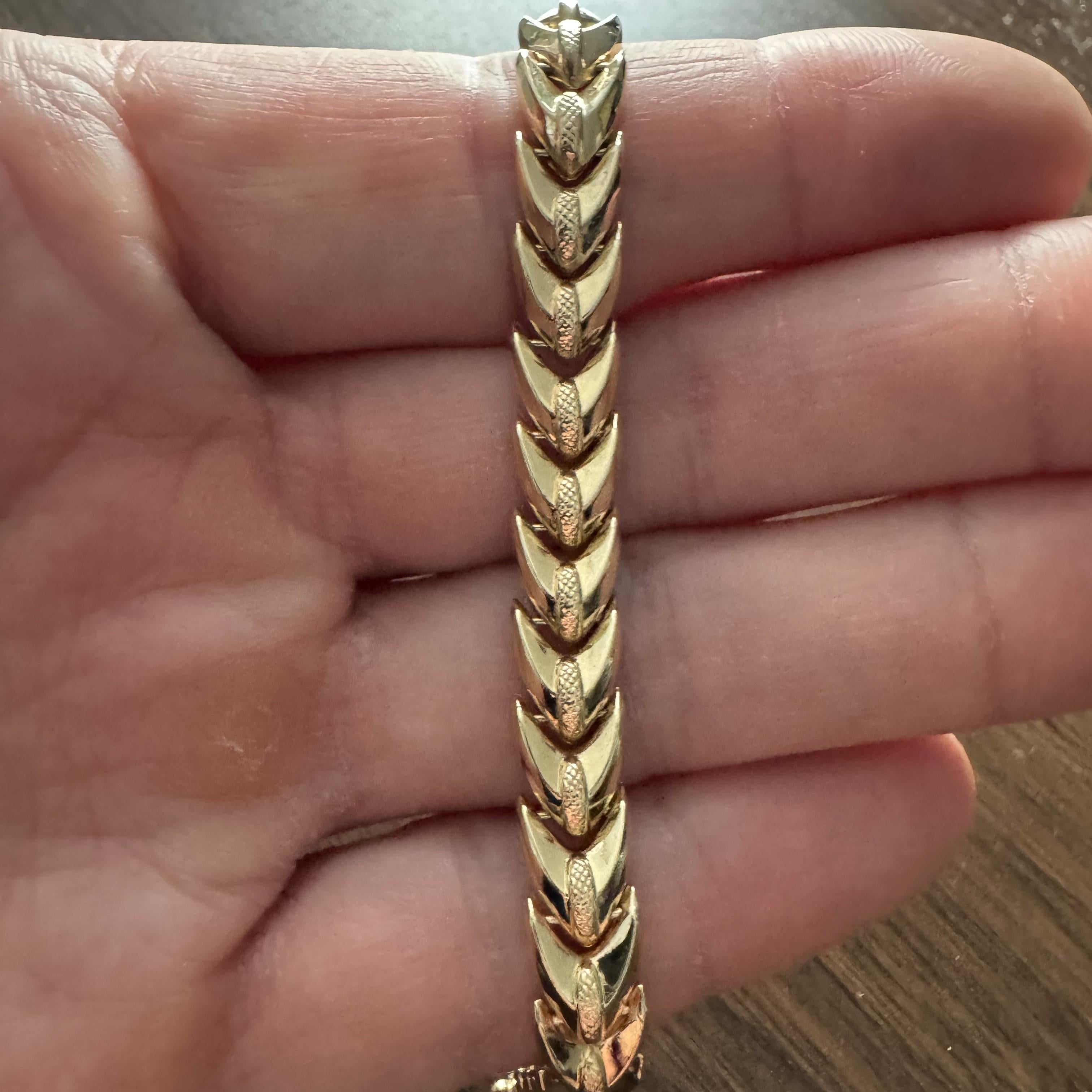 Condition:  Excellent Condition, Professionally Cleaned and Polished
Metal:  14k Gold (Marked, and Professionally Tested)
Weight:  13.7g	
Length:  7.5 Inches
Width:  8mm
Closure:  Box Tab Insert with Safety Latch
Markings:  