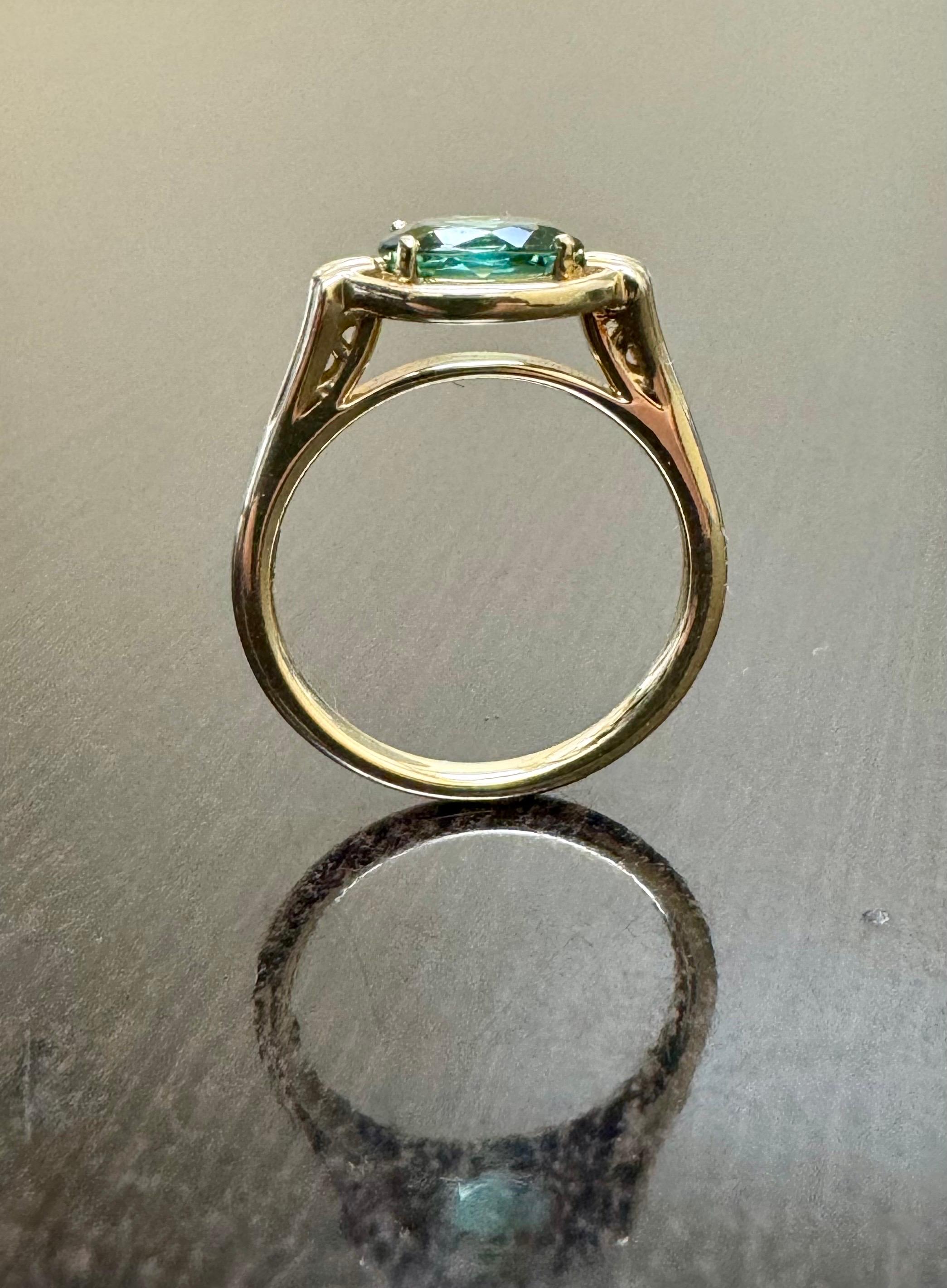 DeKara Designs Collection

Our latest design! An Elegant and Lustrous Oval Teal Tourmaline Handmade in 14K Yellow Gold.

Metal- 14K Yellow Gold, .583.

Stones- Genuine Oval Blue Green Tourmaline 1.38 Carats.

Size- 6 1/2.  FREE SIZING!!!!

Latest of