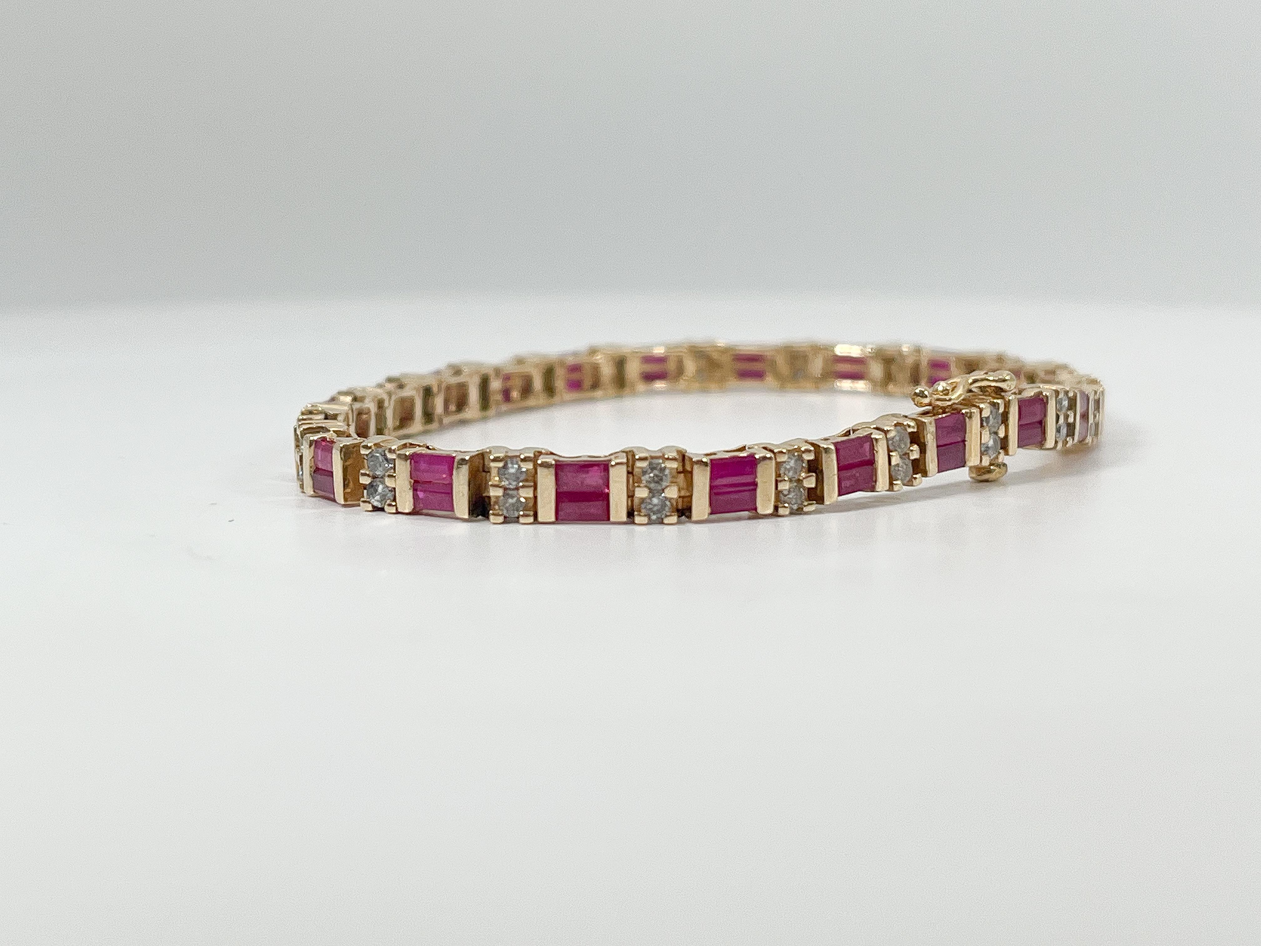 Baguette Cut 14K Yellow Gold .14 CTW Ruby and .20 CTW Diamond Bracelet For Sale