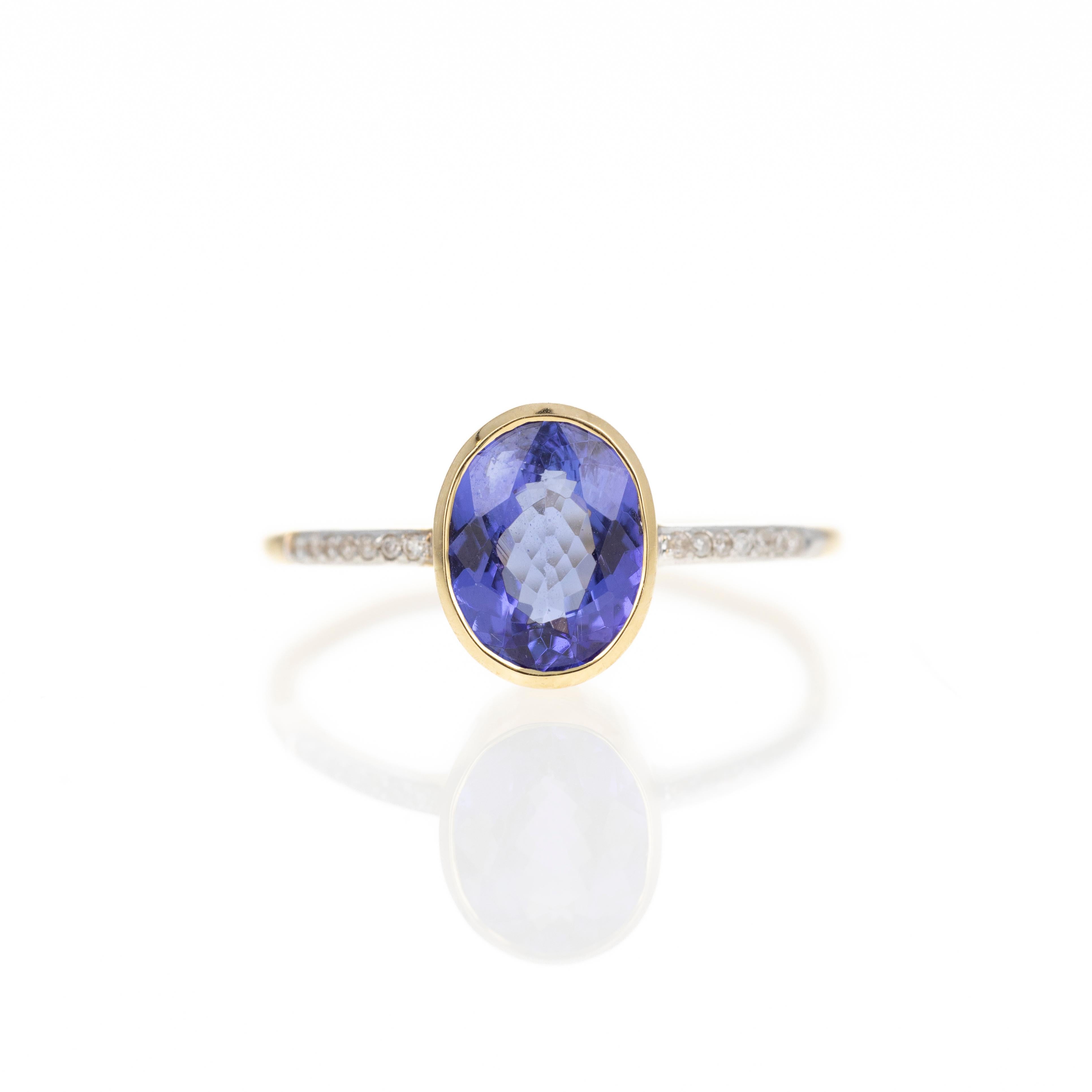 Bague en or jaune 14 carats avec diamants et tanzanite de 1,47 carat en vente 1
