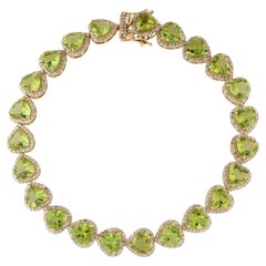 14 Karat Gelbgold 14,70 Karat herzförmiges Peridot & Diamant-Gliederarmband
