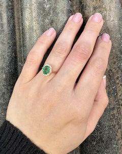 14k Yellow Gold 1.48ctw Oval Emerald w/ Diamond Halo Brushed Finish Ring