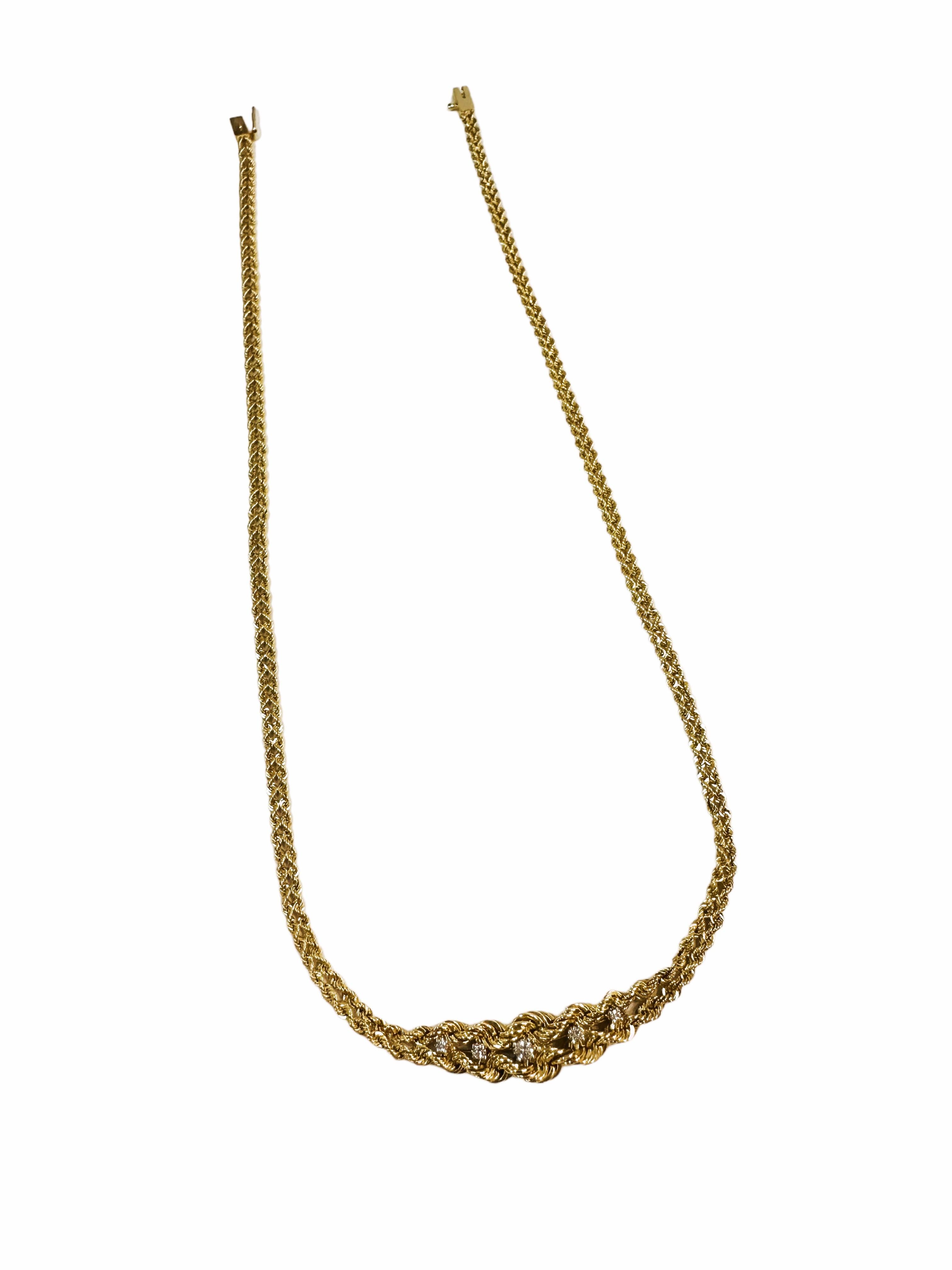 I just love this necklace!  It's understated but yet very elegant.  Not over-powering.    It has 5 brilliant cut diamonds strategically placed along the front of the necklace.  The largest is 2.0 x 2.0 x 1.5 mm and is the center stone, the 2