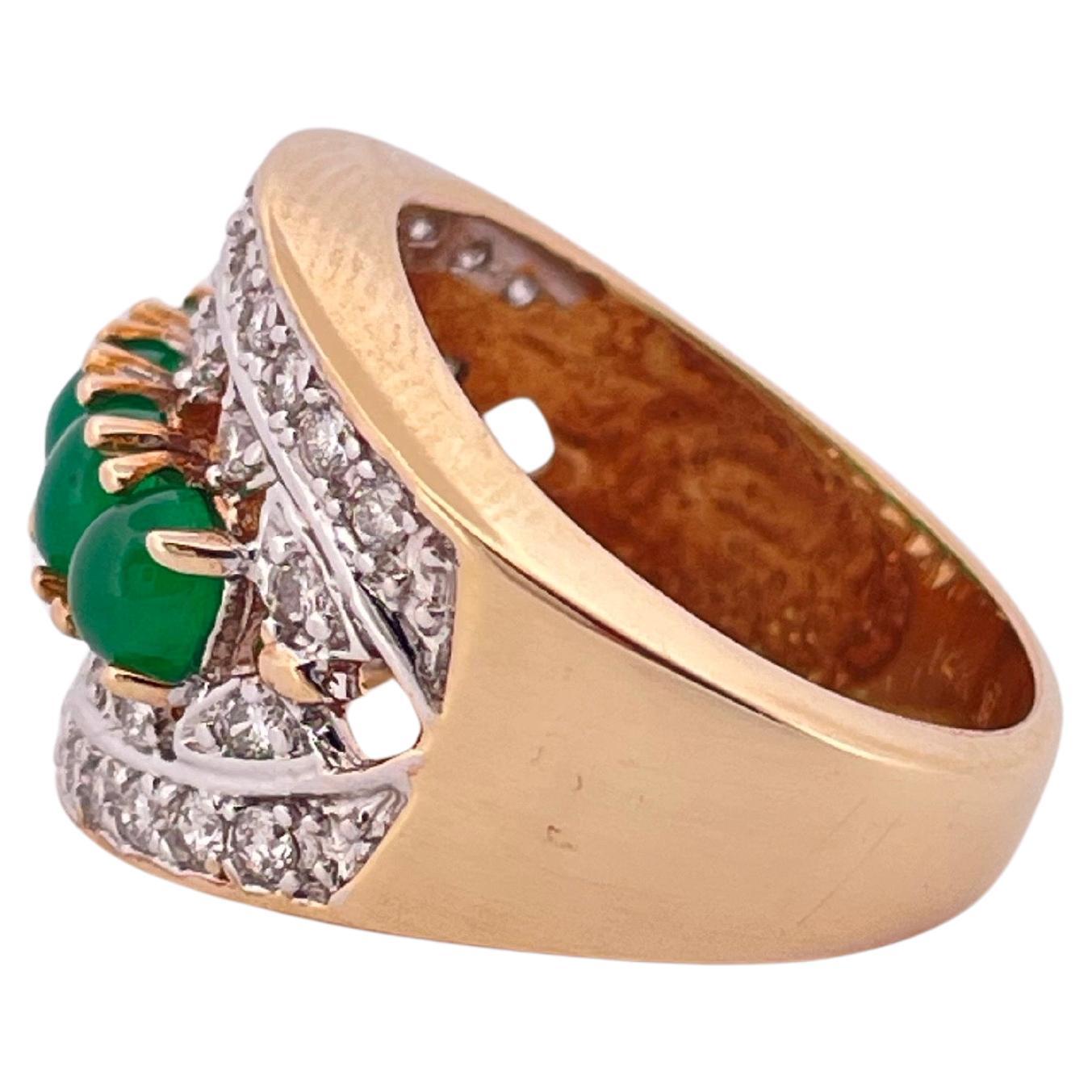 Anillo de oro amarillo de 14 quilates con esmeralda cabujón de 1,50 quilates y diamante de 1,00 quilates Corte oval en venta