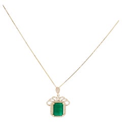 Collana con ciondolo in oro giallo 14K con smeraldo da 1,57ct e diamante da 0,24ctw, 18 pollici