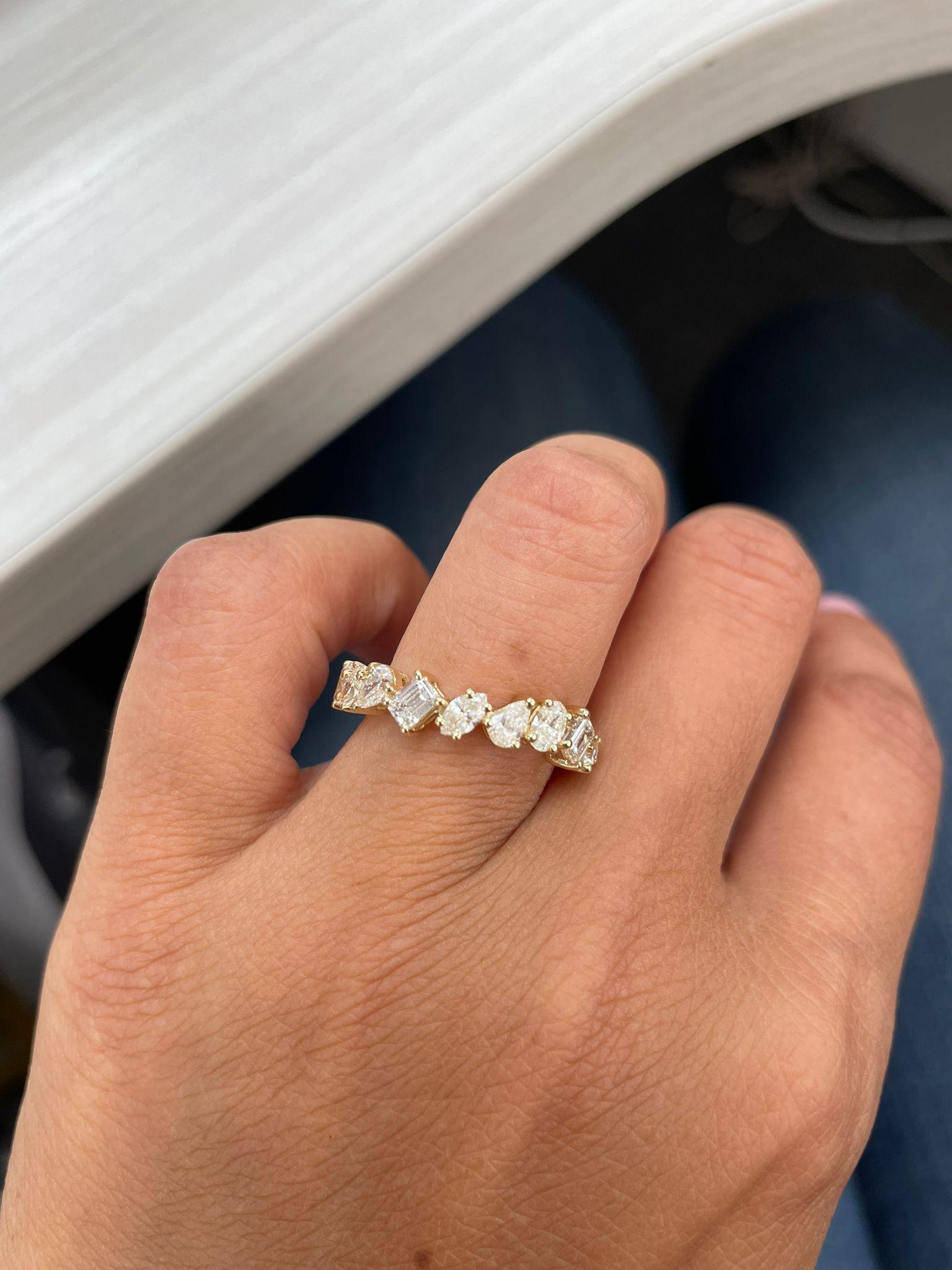 This Elegant and Charming half way around Band crafted of 14K Gold features 10 Diamonds weighing 1.59cts, Diamond Color & Clarity is GH-SI1. This Ring can be sized one size up or down by your Jeweler. Size 7
 
 14K Gold
 10 Natural Diamonds 1.59ct