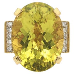 Bague en or jaune 14 carats, sertie d'un quartz ovale « Bright Lemon » de 16,10 carats au total, rehaussée de diamants sur les côtés