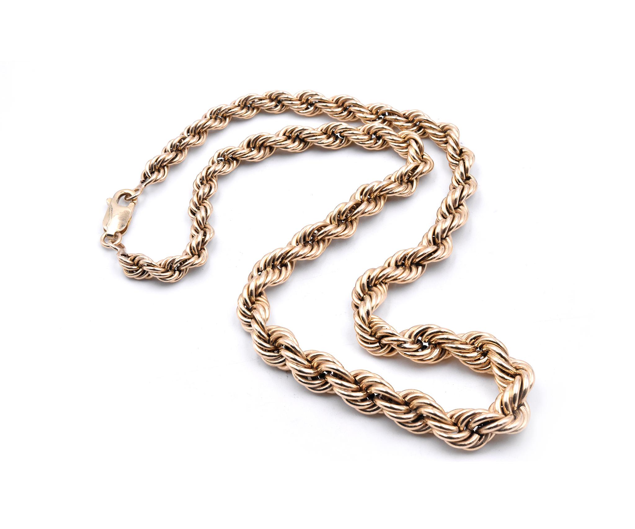 Designer: Custom Design
Material: 14k yellow gold
Dimensions: necklace measures 17-inches in length, 7.87mm in width
Weight: 24.5 grams
