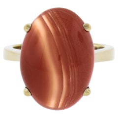 Bague solitaire en or jaune 14 carats avec cabochon ovale de 18 x 13 mm et agate orange sertie à la broche