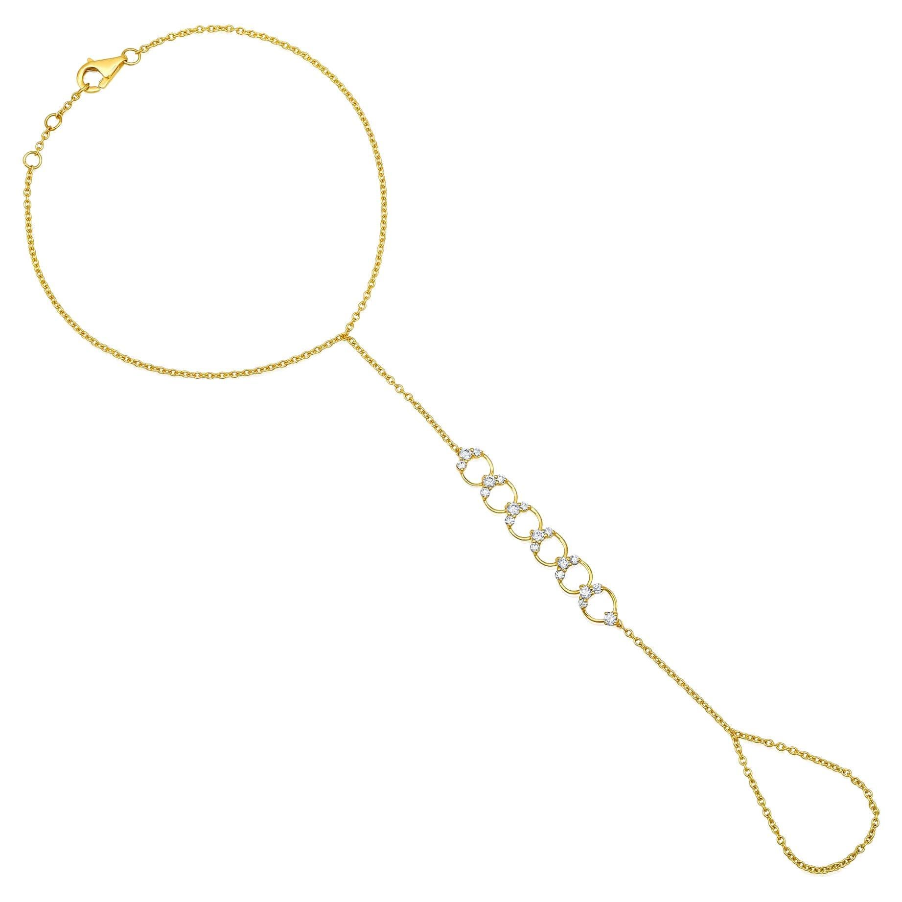 Chaîne à la main cercles célestes en or jaune 14 carats avec 19 diamants en vente