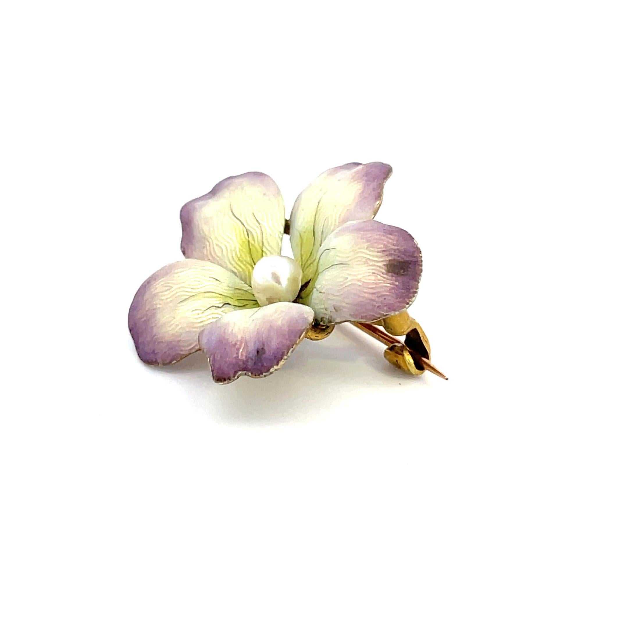 - 14K yellow gold 
- Pearl 
- Enamel 
- 4.48 grams
- 1910 Art Nouveau 

This beautiful flower pin is from 1910 Art Nouveau and is made in 14k yellow gold with enamel and and pearl. The 14k gold makes up the flower shape of the pin and can be seen on