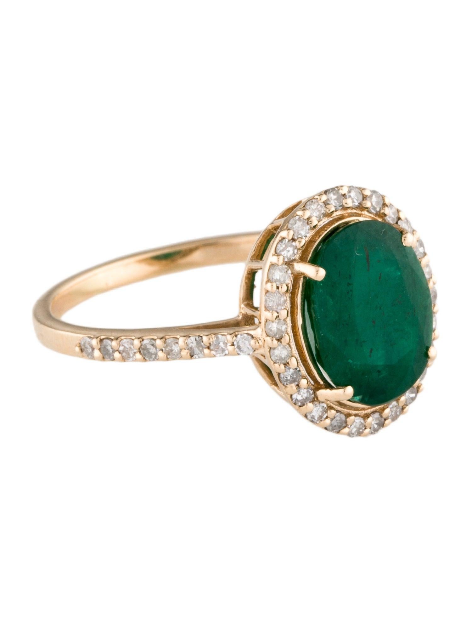 Unveil the epitome of elegance with our 14K Yellow Gold Cocktail Ring, featuring a mesmerizing 1.92 carat Oval Brilliant Emerald, encircled by 0.29 carats of near colorless, single-cut diamonds. This size 7 ring combines the vibrant allure of the