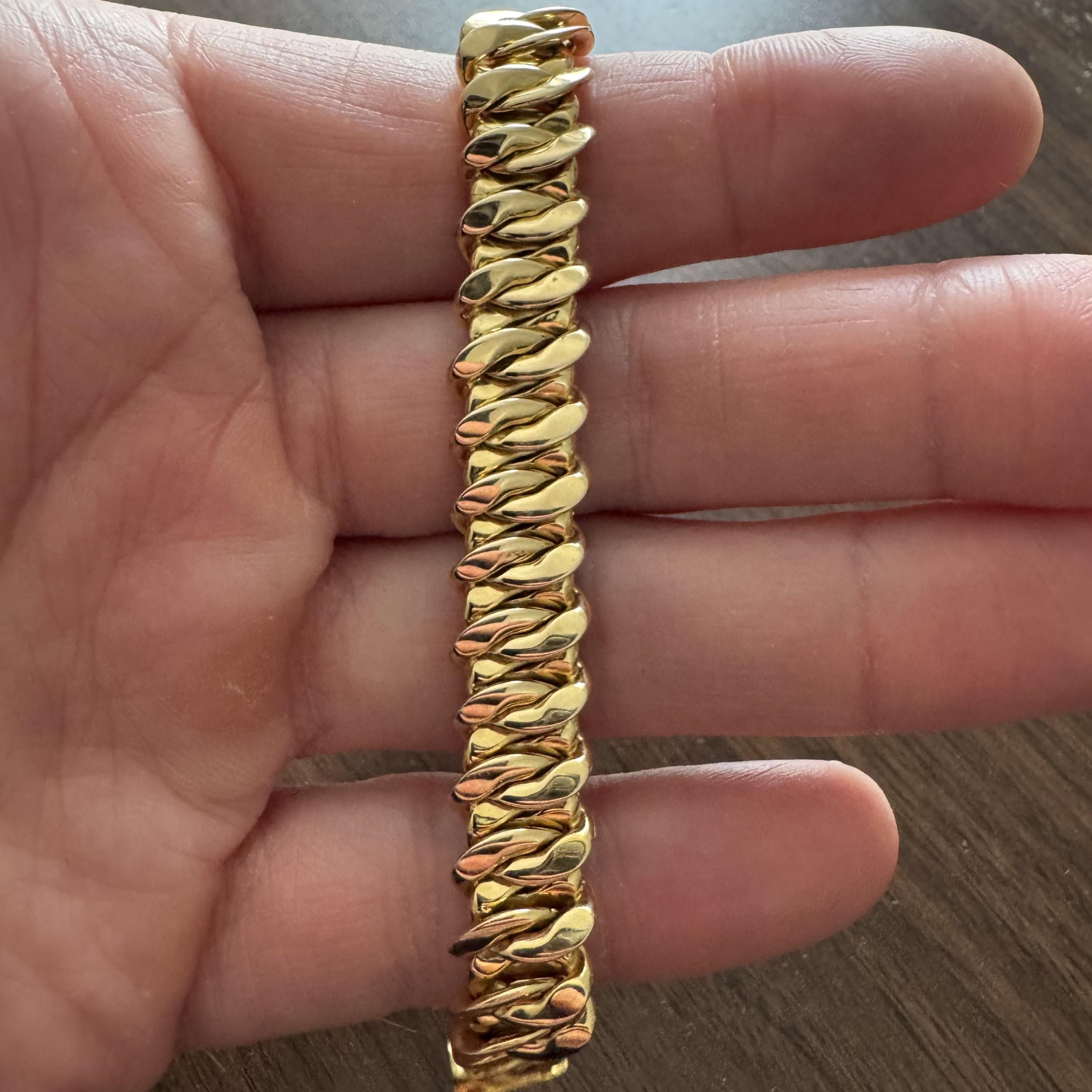 Condition:  Excellent Condition, Professionally Cleaned and Polished
Metal:  14k Gold (Marked, and Professionally Tested)
Weight:  19.3g
Length:  7 Inches
Width:  11mm
Closure:  Box Tab Insert with Safety Latch
Markings:   
