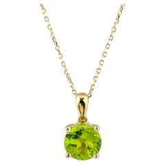 Collar con colgante de oro amarillo de 14 quilates y un peridoto redondo de 1,94 quilates