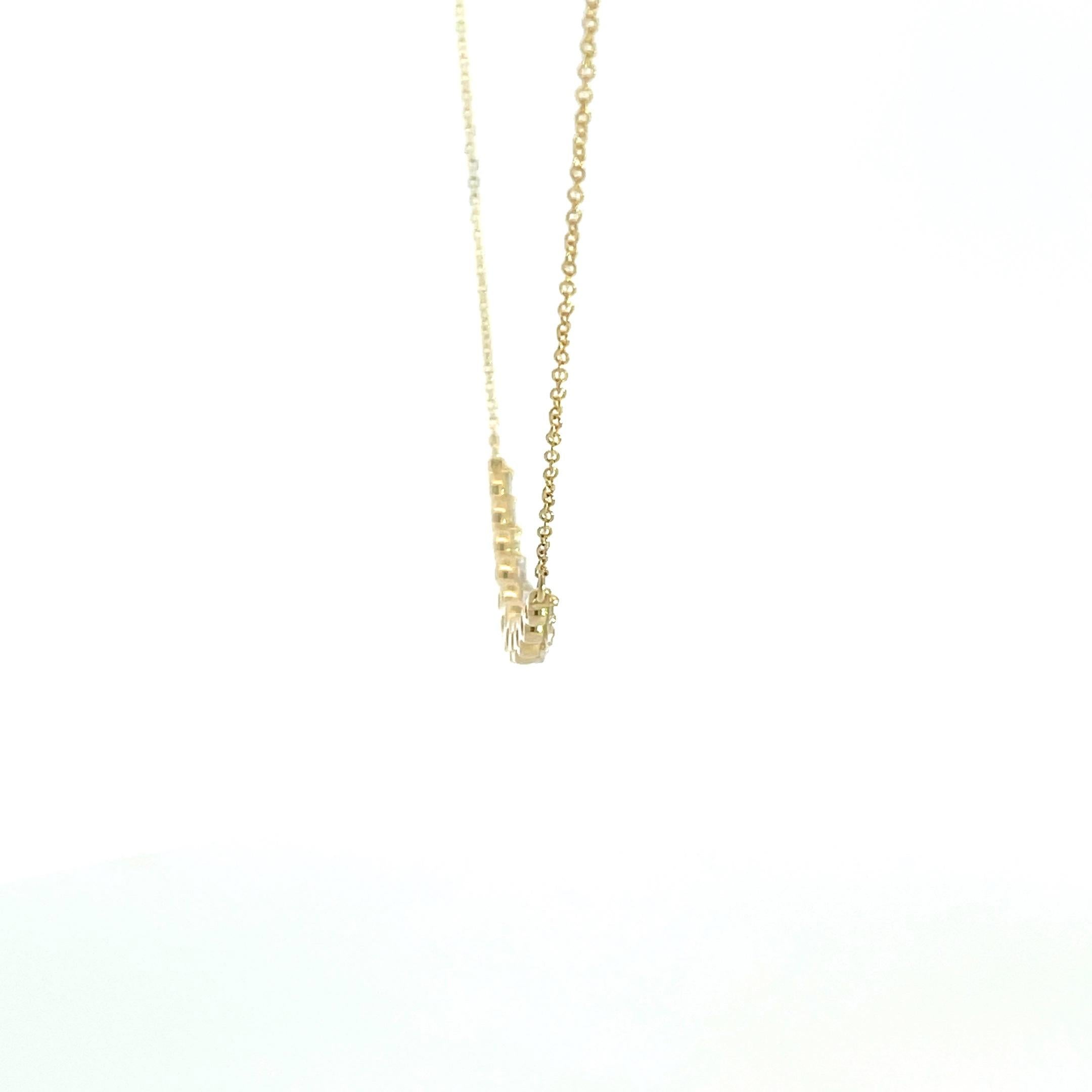 Beautiful 14K yellow gold diamond smile necklace. Can also be called a graduated, curved, or bar necklace. This fashion forward look can be dressed up, dressed down, and worn for any and all occasions. The diamond quality is white GH in color and SI