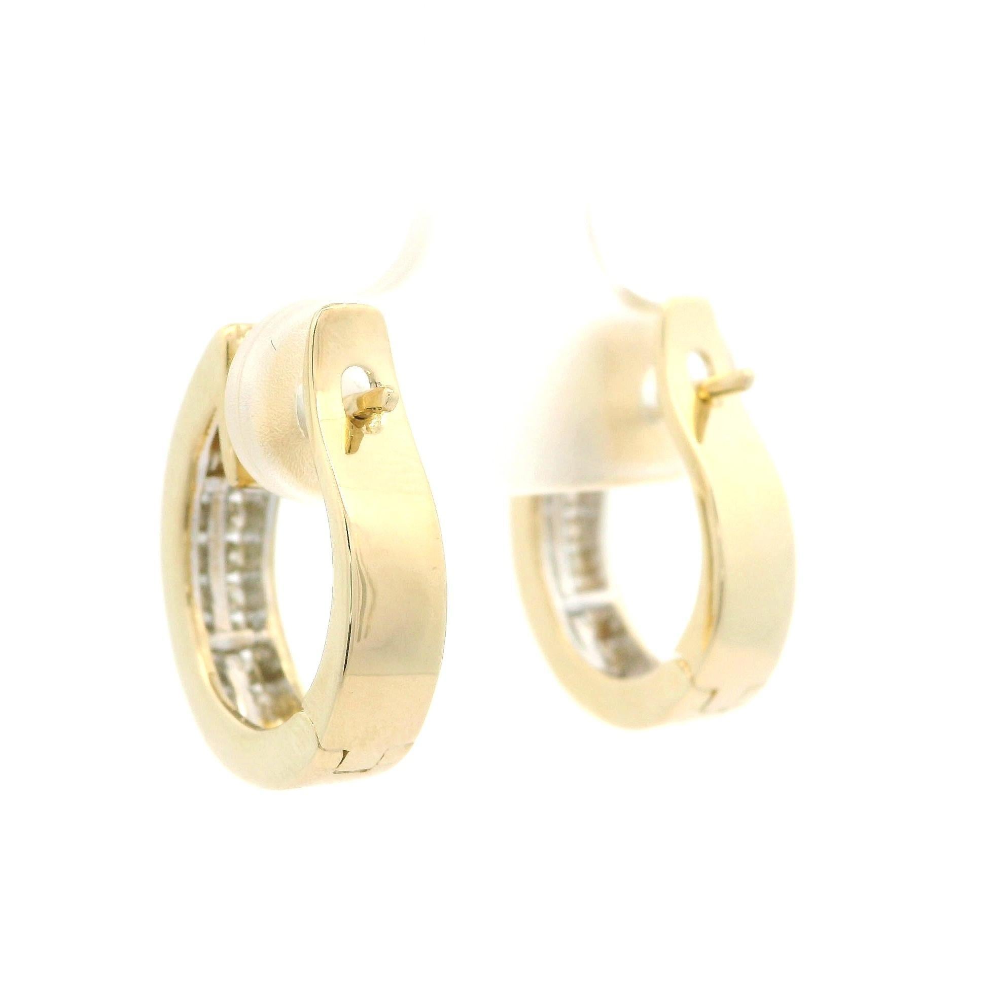–Stone(s)–
(40) Natural Genuine Diamonds - Round Brilliant Cut - Channel Set - I/J Color - SI1-I1 Clarity - 0.60ctw (approx.)

Material: Solid 14K Yellow Gold
Weight: 5.32 Grams
Backing: Snap closure (Pierced ears required)
Overall Width: 15.1mm