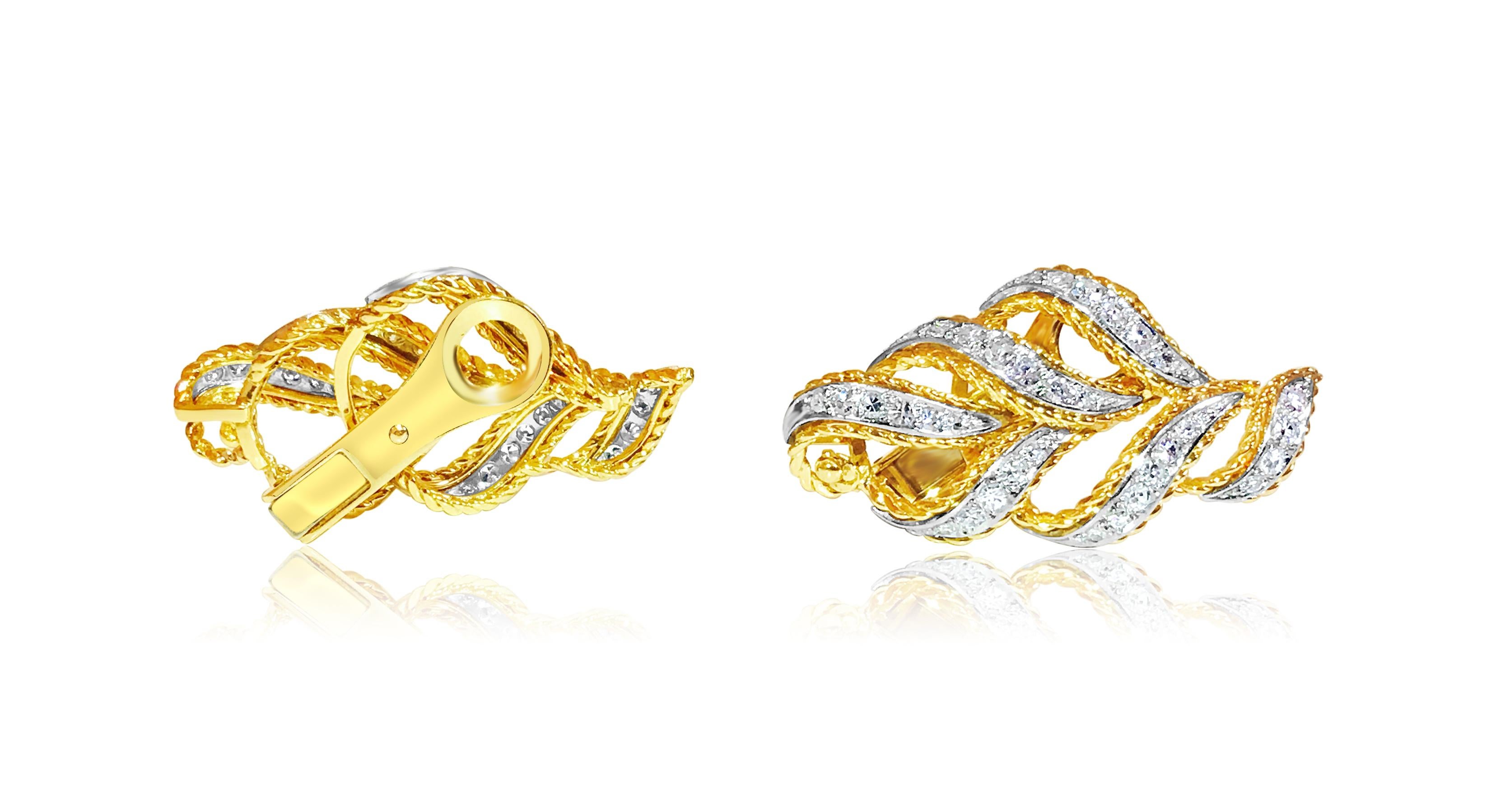 Fashioned from 14K yellow gold, these clip-on earrings feature a total carat weight of 2.00 carats of round-cut diamonds, boasting VS clarity and G color. Their elegant leaf-like design exudes sophistication, while the diamonds' superb luster and