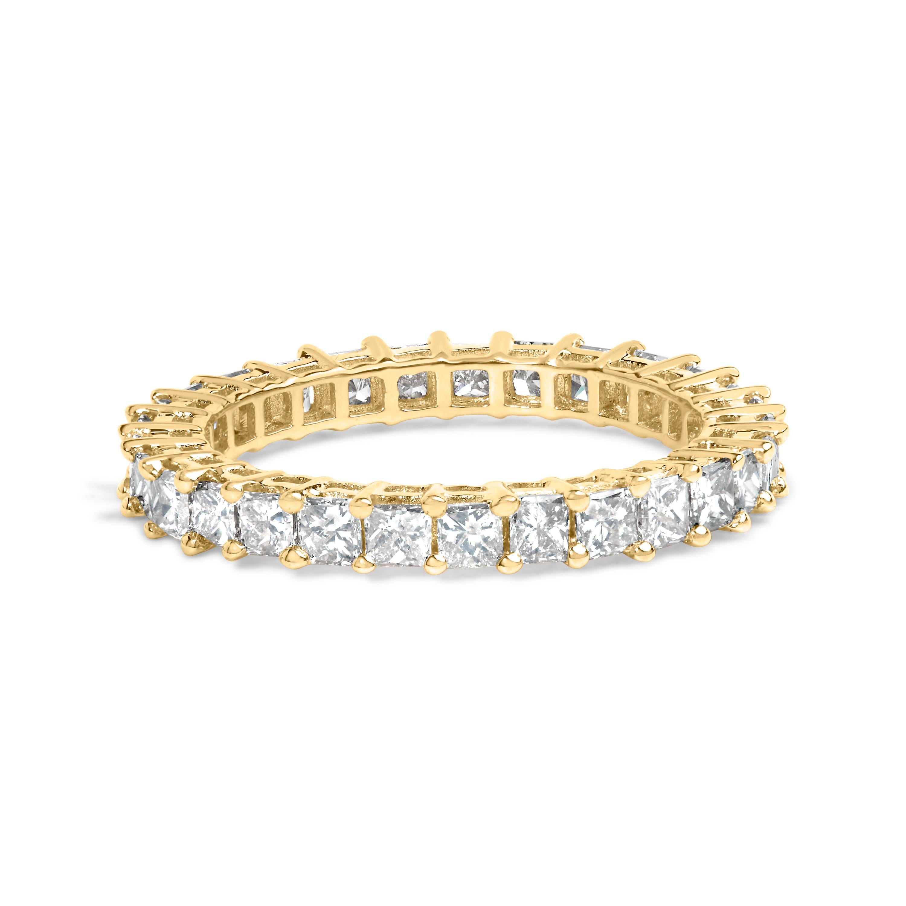 Captured in this exquisite creation is the essence of eternal elegance – a 14K yellow gold eternity band that whispers tales of everlasting love and commitment. Each of the 29 natural, princess-cut diamonds, totaling a resplendent 2 carats, is