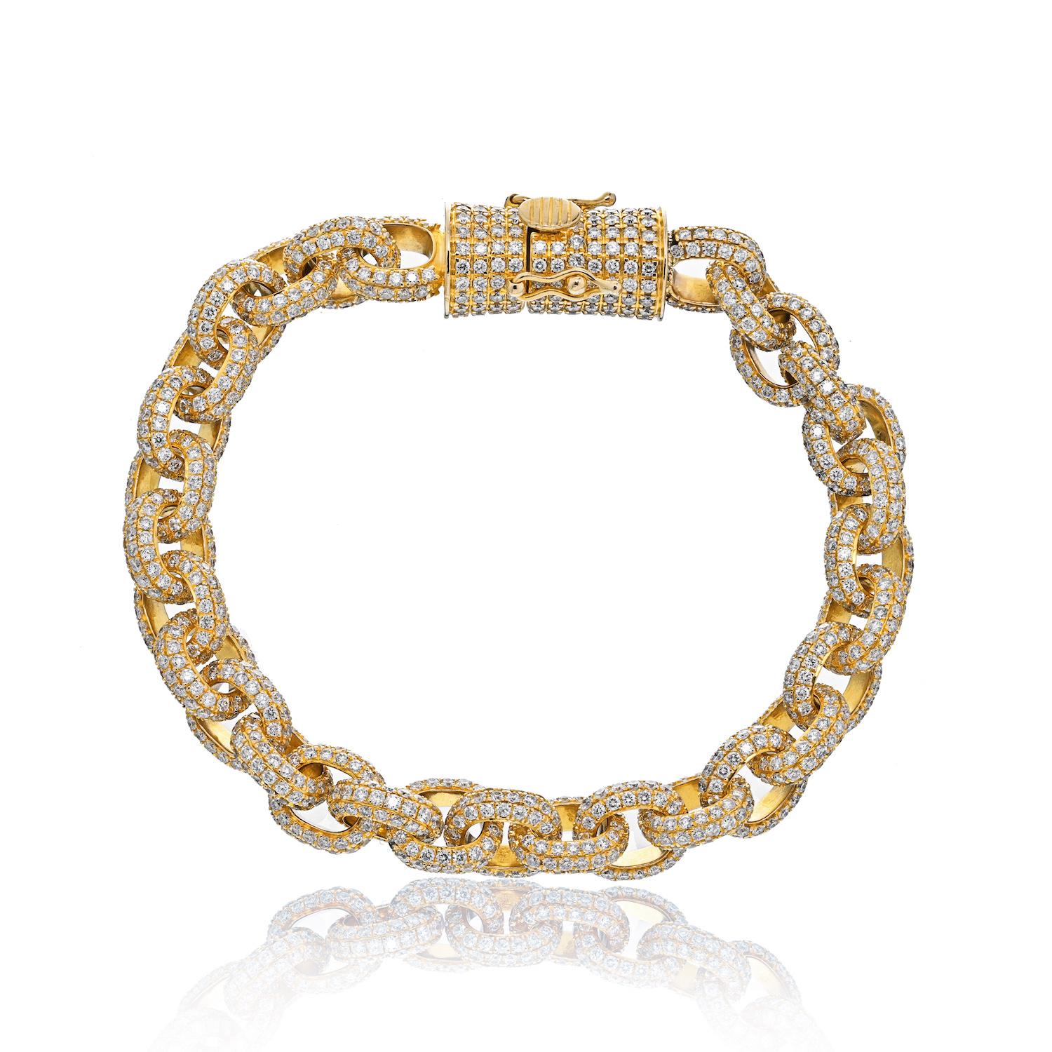 This is a stunning diamond link bracelet crafted in 14k yellow gold mounted with round-cut diamonds over solid gold links. Each diamond is a micro-round cut diamond but rest assured the sparkle is amazing! Even the lobster lock is set with diamonds
