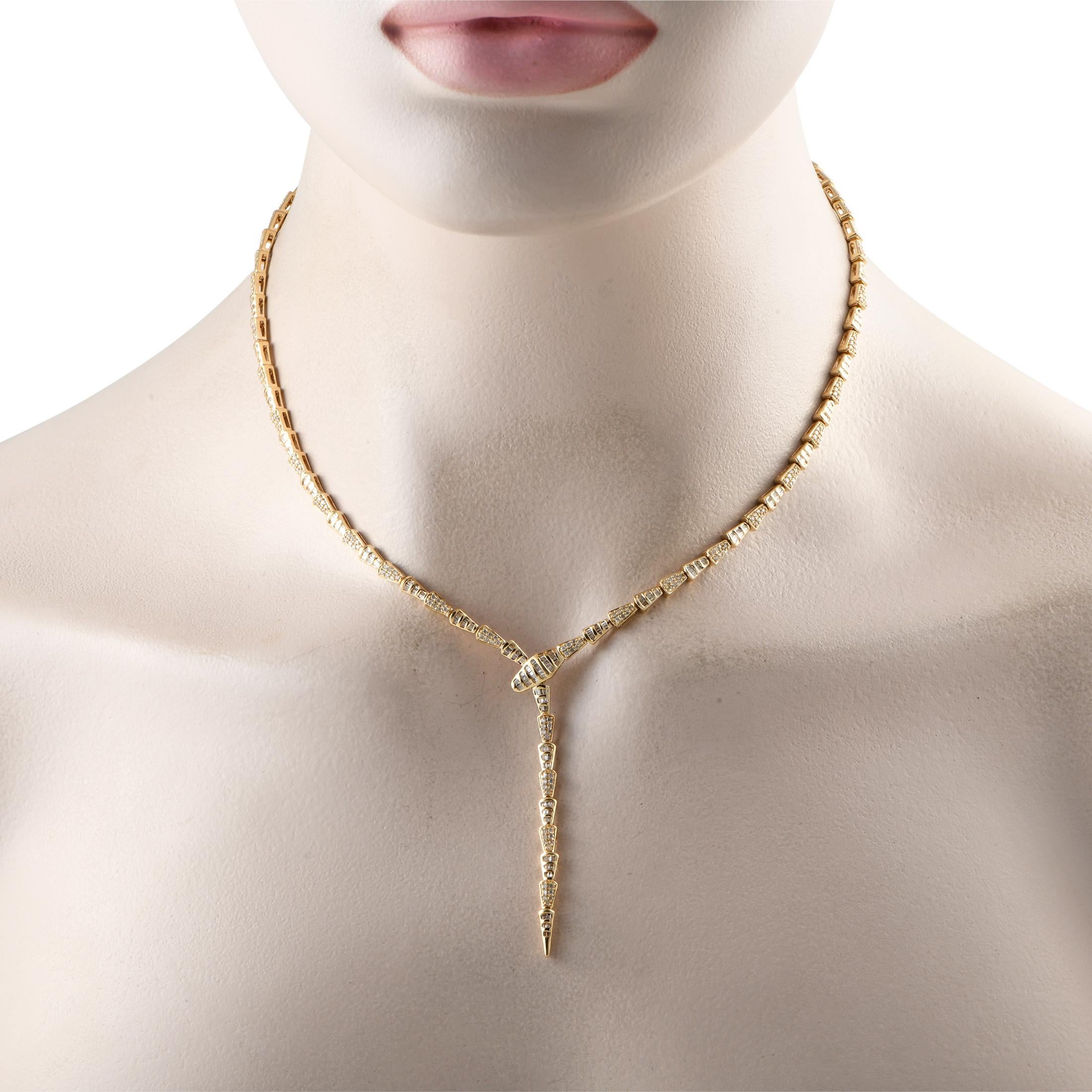 A stylish serpentine shape makes this luxury necklace an elegant addition to any ensemble. This pieces 14K Yellow Gold links shine to life thanks to a stunning array of inset Diamonds, which together possess a total weight of 2.01 carats. It