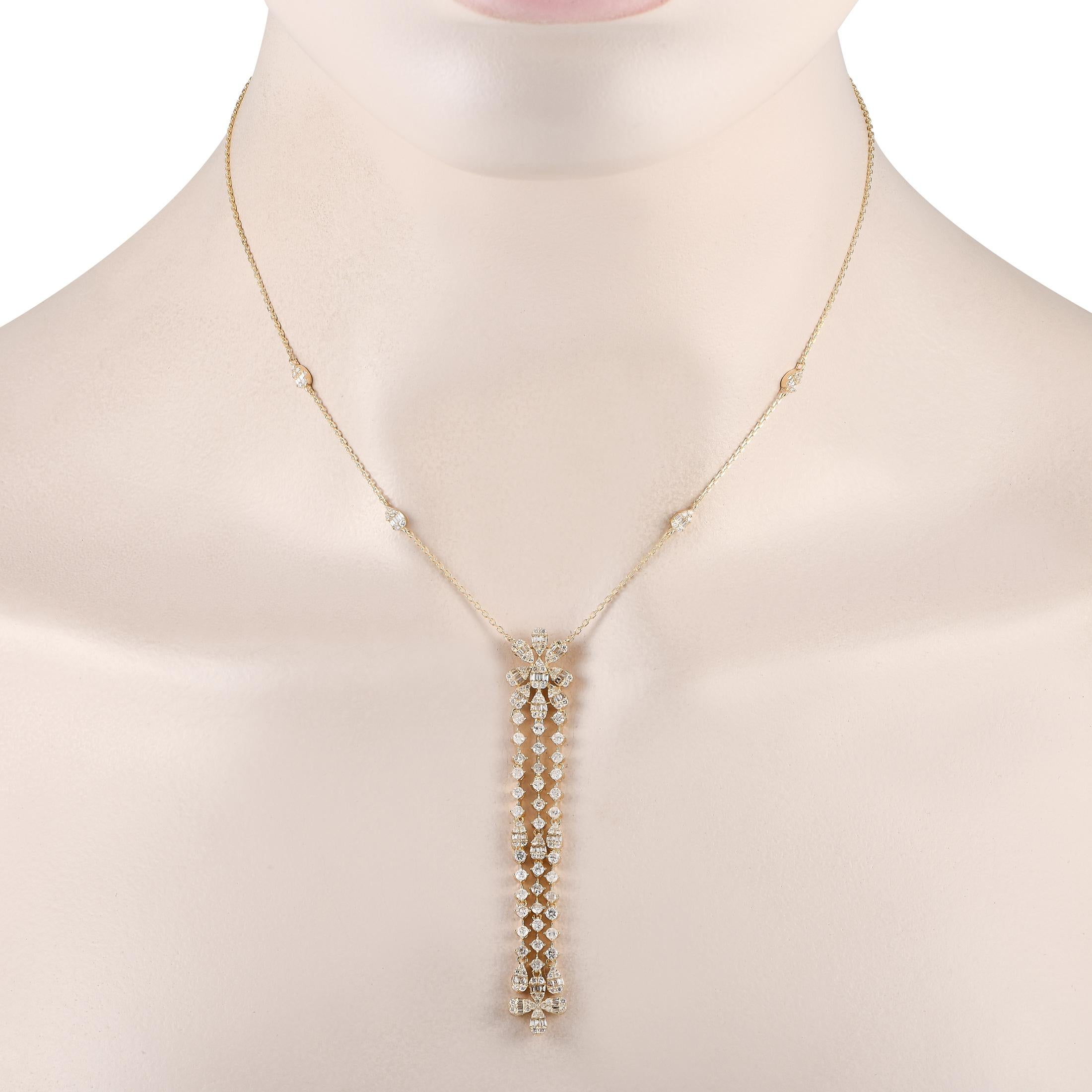 Add balance to a bold and statement-making outfit with this Y-shaped necklace's pared-down yet elegant appeal. It features a 14K yellow gold chain with four pear-shaped clusters of baguette and round diamonds. A central and linear element, composed