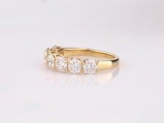 Bague ronde en or jaune 14 carats sertie de sept diamants naturels totalisant 2,10 carats