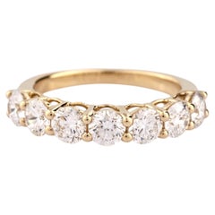 Bague ronde en or jaune 14 carats sertie de sept diamants naturels totalisant 2,10 carats