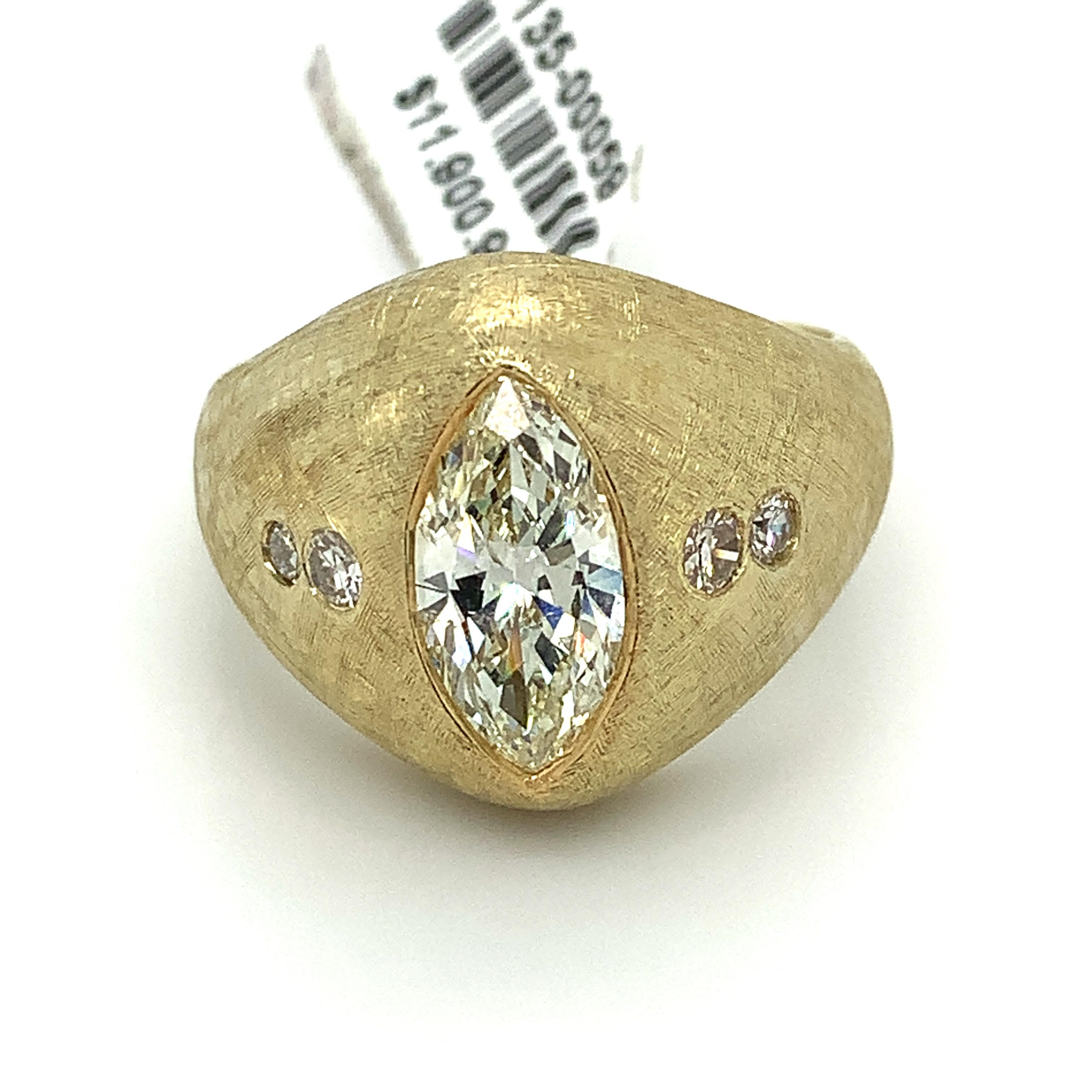 14k Yellow Gold  Marquise Diamond With Round Shape Diamond Ring
Size 10.5
4.0 Grams
1 Center Marquise Cut Diamond 2.11 Carats 
Color: K-L 
Clarity: Si2
4 Round White Diamonds 
0.20 Carats Total Weight
Color: I Clarity: Si1
