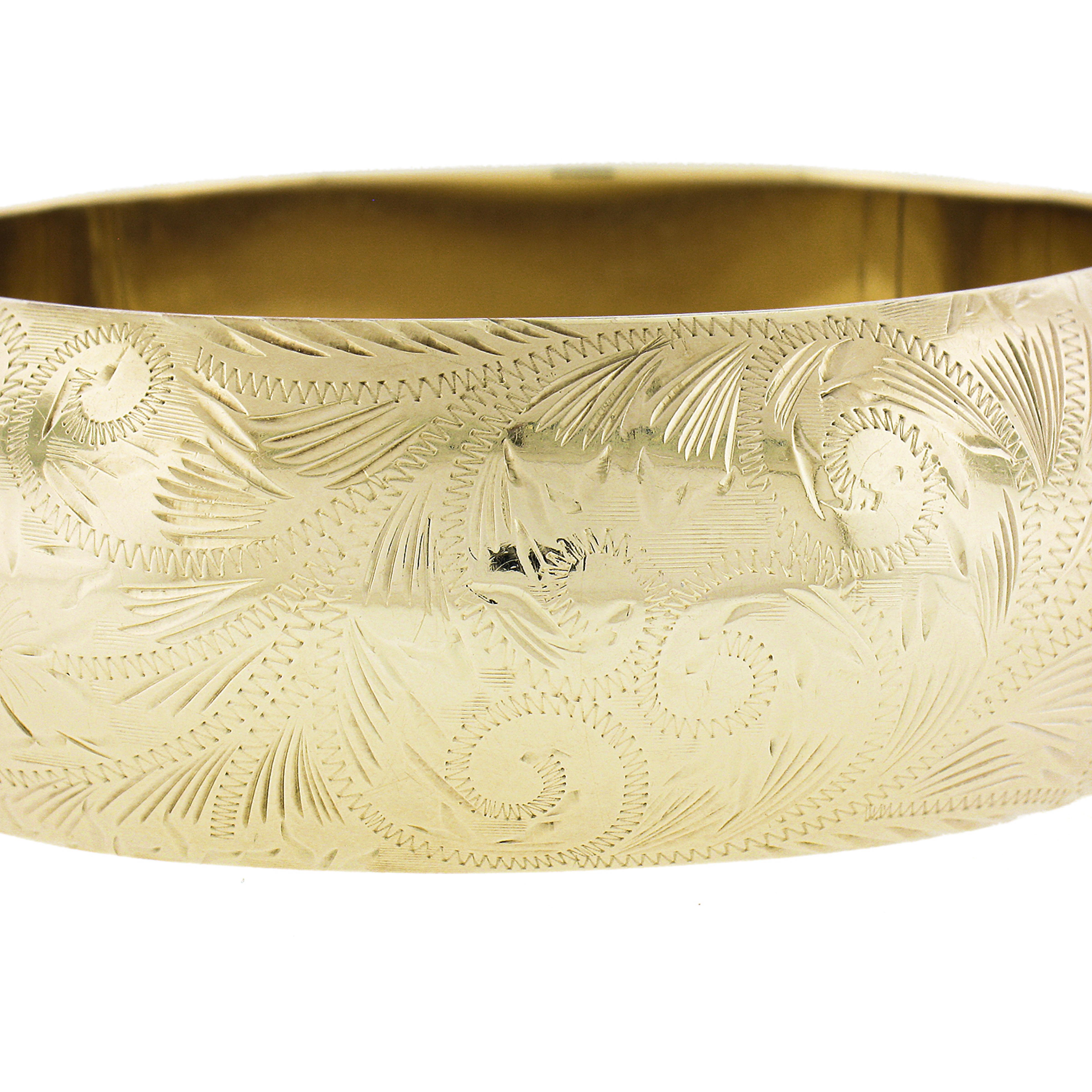 14k Yellow Gold 21.8mm Wide Hand Engraved All Around Open Hinged Bangle Bracelet In Excellent Condition For Sale In Montclair, NJ