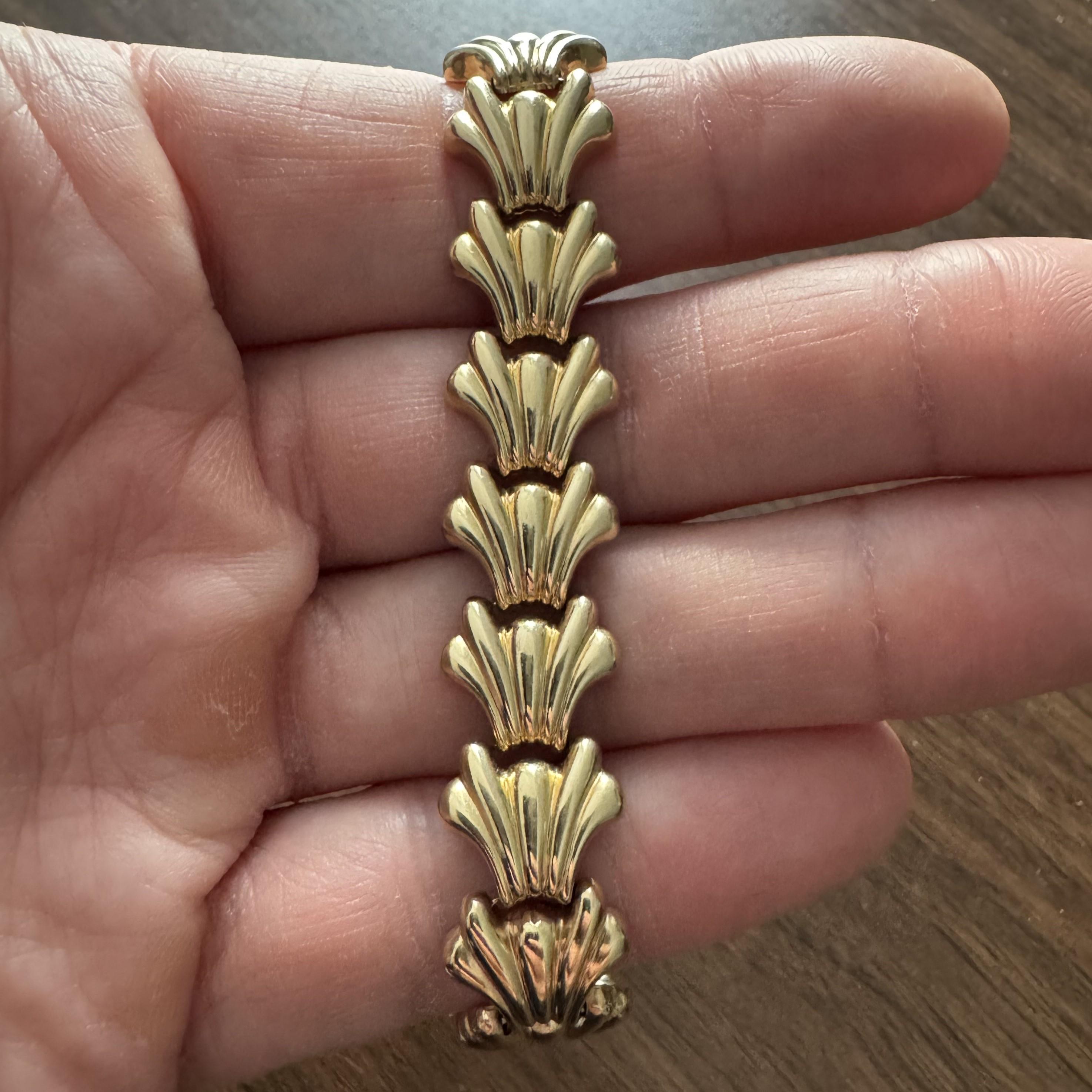 Condition:  Excellent Condition, Professionally Cleaned and Polished
Metal:  14k Gold (Marked, and Professionally Tested)
Weight:  21g
Length:  7.5 Inches
Width:  15mm
Closure:  Box Tab Insert with Safety Latch
Markings:   