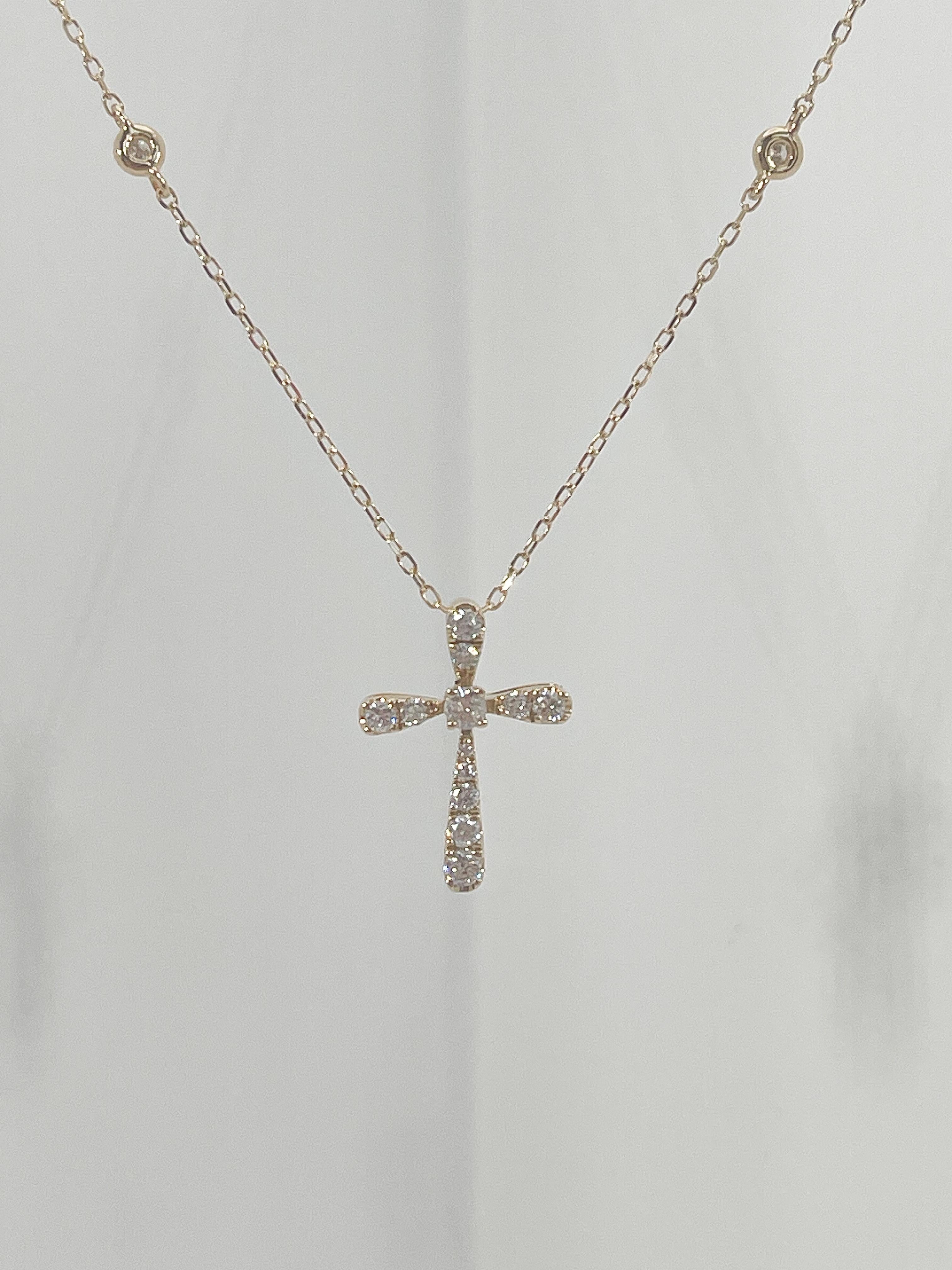 Women's 14K Yellow Gold .22 CTW Diamond Cross Pendant Necklace with Diamond Stations For Sale