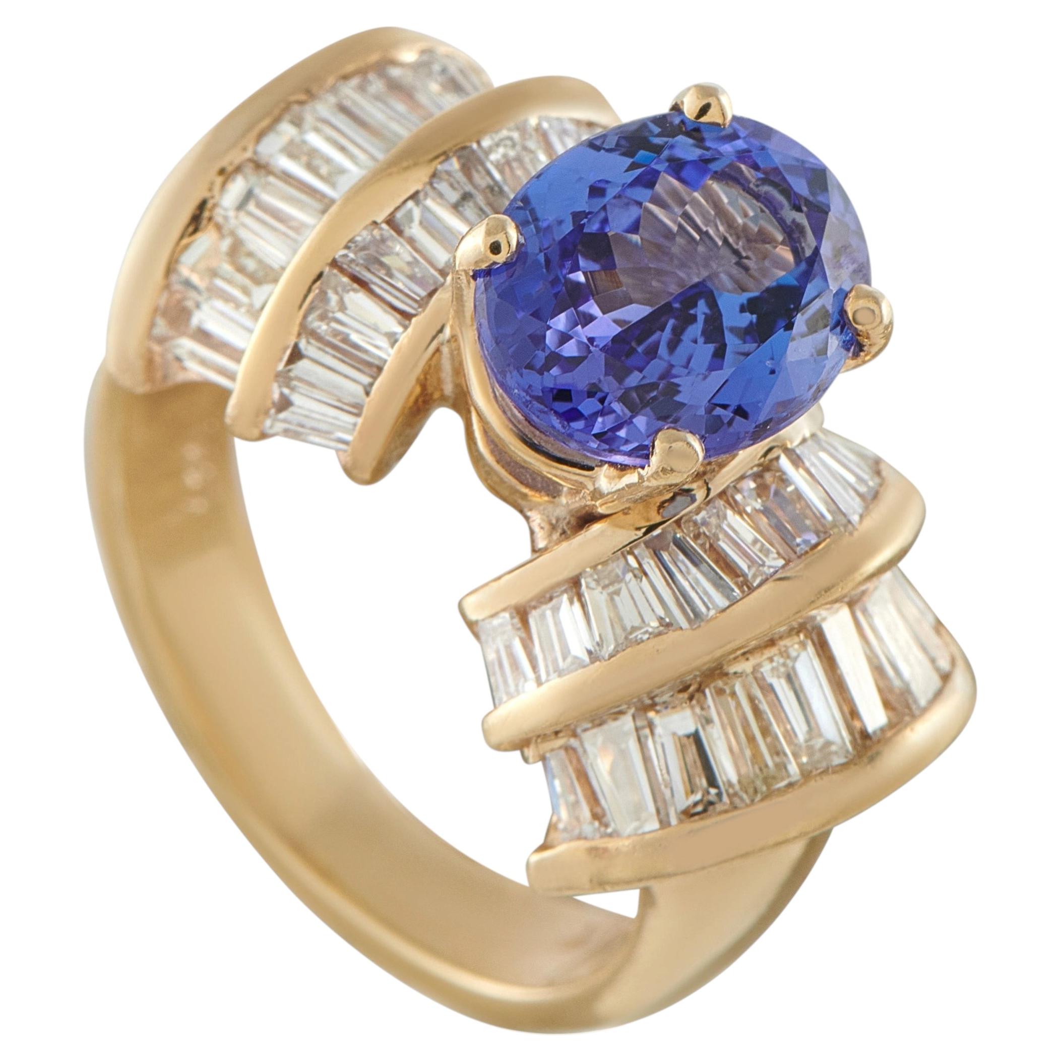 Anillo de cóctel de oro amarillo de 14 quilates con diamantes y tanzanita de 2,20 ct MF12-062626