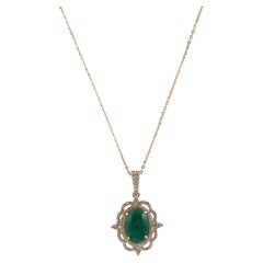 Collana con ciondolo in oro giallo 14K con smeraldo e diamante da 2,22 carati