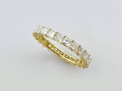 Bague « Eternity » en or jaune 14 carats, sertie de diamants naturels taille princesse pour un total de 2,30 carats