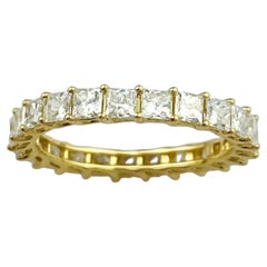 Bague « Eternity » en or jaune 14 carats, sertie de diamants naturels taille princesse pour un total de 2,30 carats