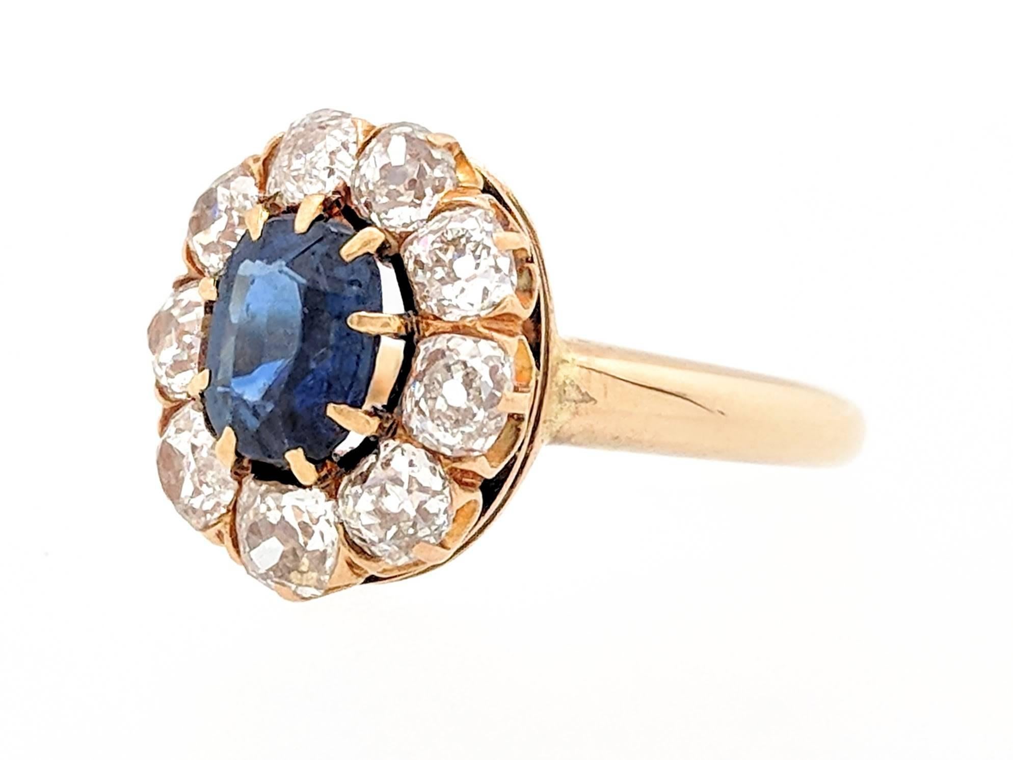 Oval Cut 14 Karat Yellow Gold 2.35 Carat Sapphire and Diamond Estate Ring For Sale