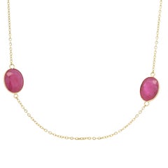 Collar de oro amarillo de 14 quilates con rubí ovalado de 23,63 quilates engastado en bisel por metros