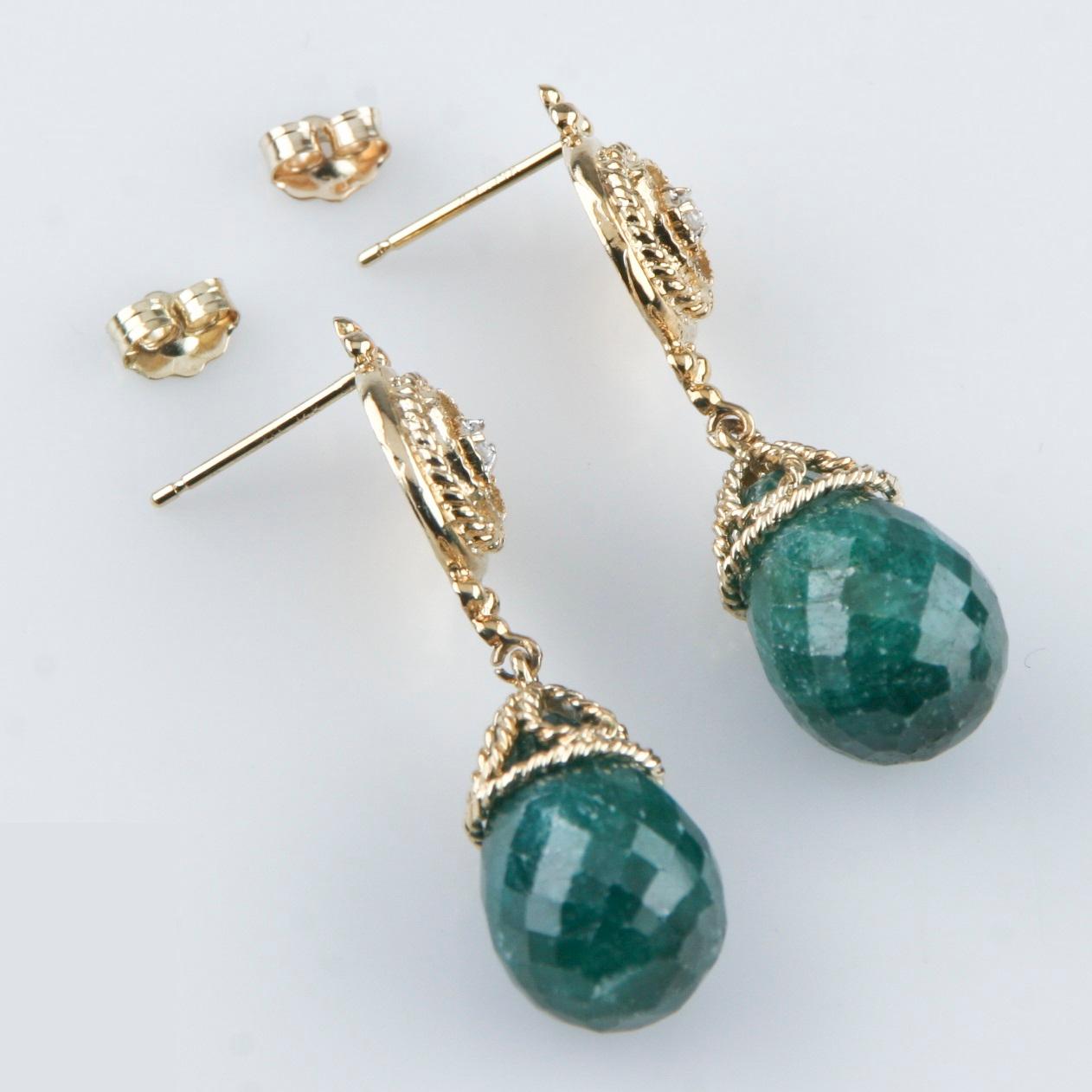 One pair electronically tested 14KT yellow gold ladies cast & assembled emerald and diamond earrings with standard backs.
Bright polish finish
Condition is good

Containing:
Two briolette cut natural emeralds
Approximate total weight of 25.00